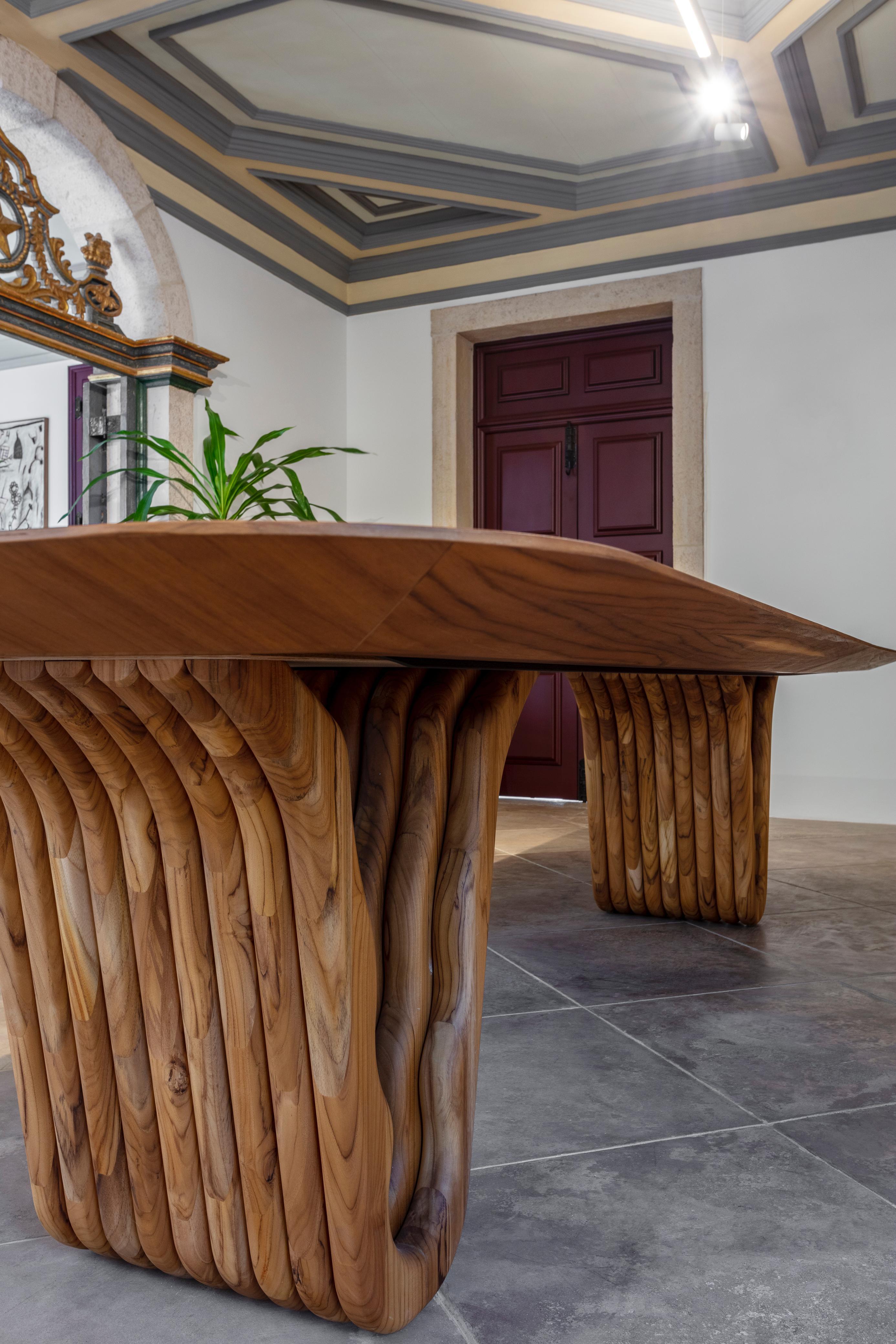 https://a.1stdibscdn.com/teak-wood-dining-table-with-sculptural-base-98-inches-top-dolomitas-collection-for-sale-picture-4/f_52822/f_346950421727870839024/Dolomitas_Dining_Table_2_master.jpg