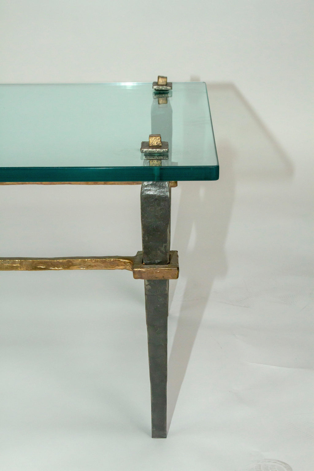 https://a.1stdibscdn.com/bronze-coffee-table-with-glass-or-stone-top-for-sale-picture-3/f_54442/f_207184321630363354804/Domani_CT2_master.jpg