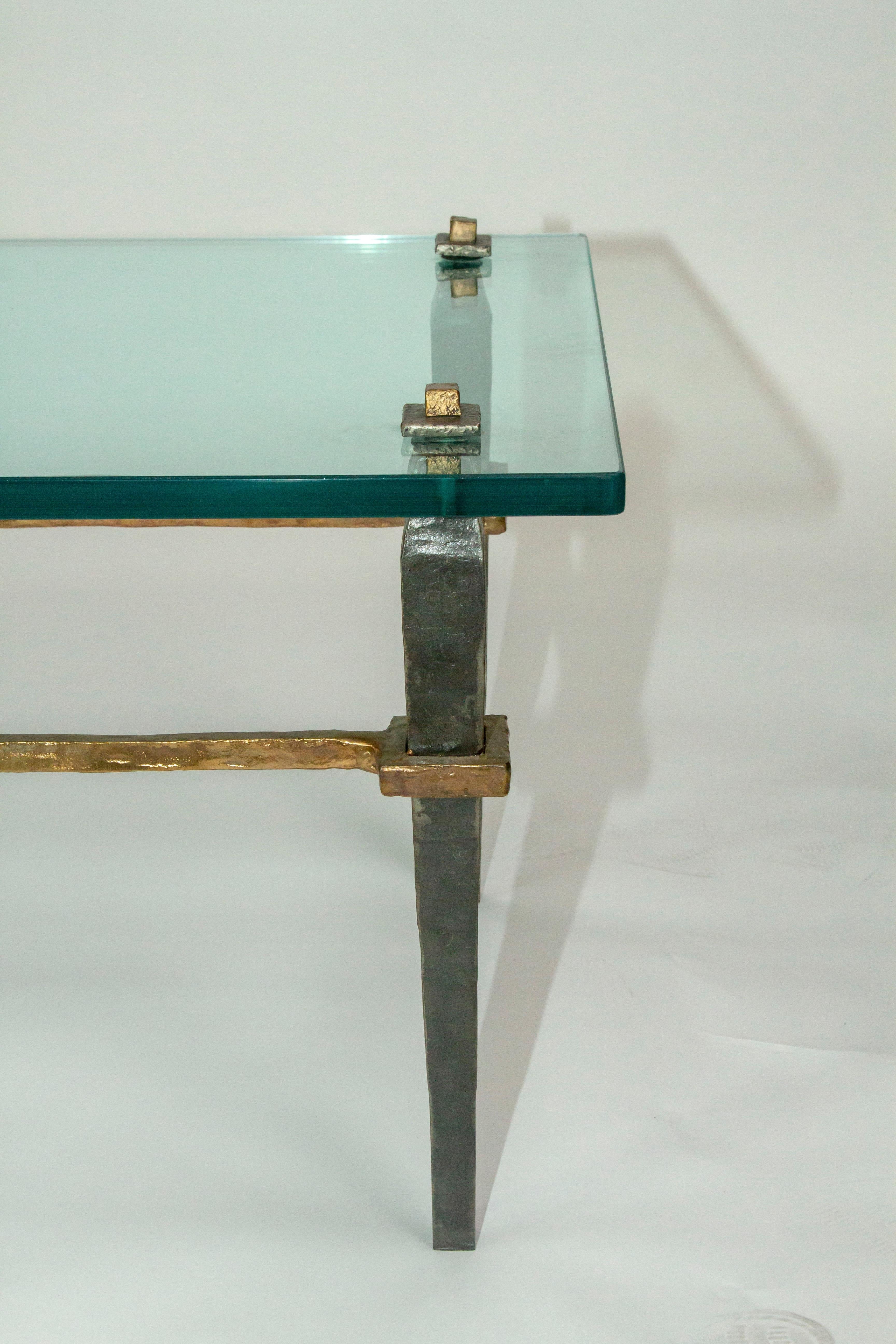 https://a.1stdibscdn.com/bronze-coffee-table-with-glass-or-stone-top-for-sale-picture-3/f_54442/f_207184321630363354804/Domani_CT2_master.jpg