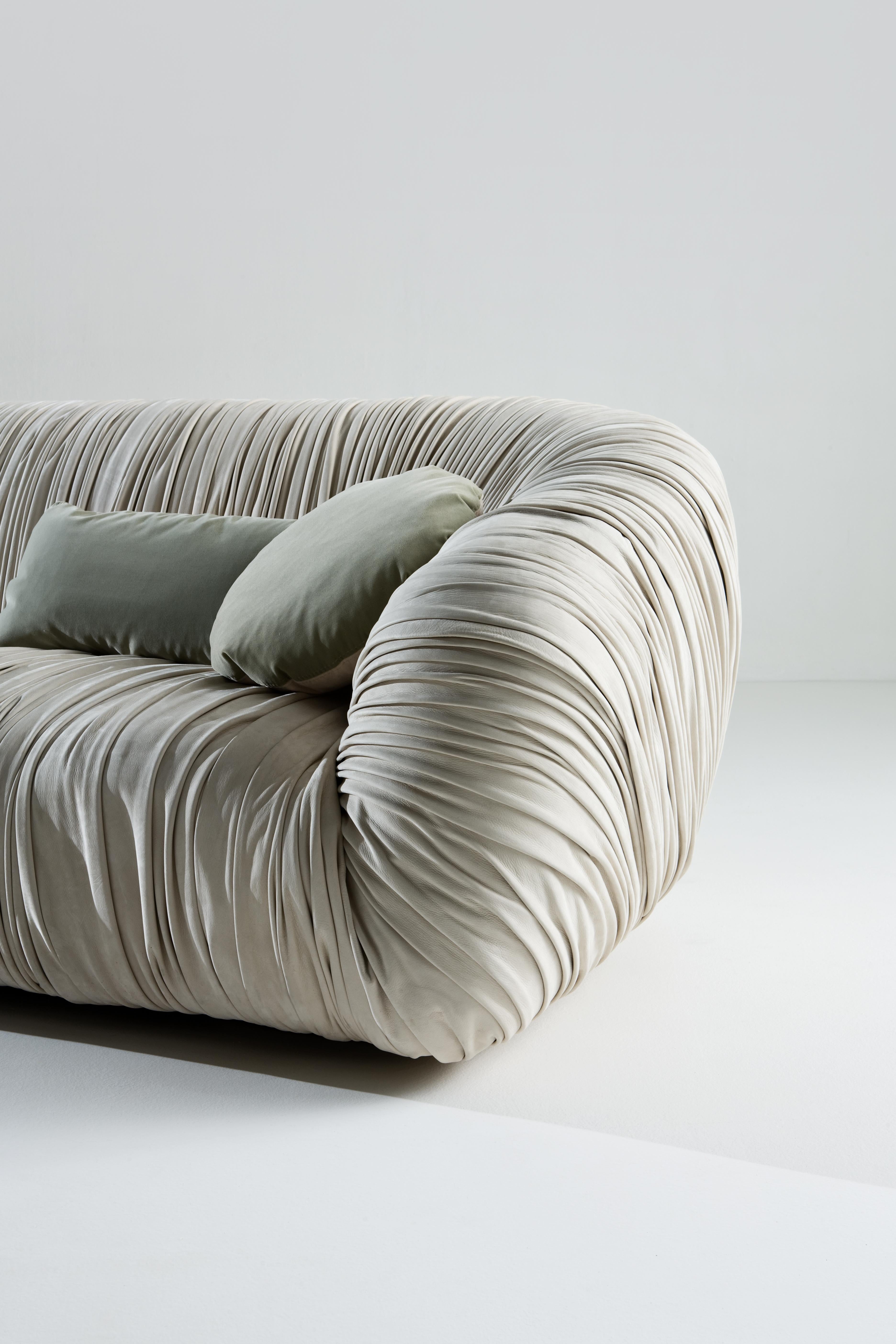 https://a.1stdibscdn.com/laurameroni-custom-draped-sofa-drape-in-leather-or-velvet-for-sale-picture-3/f_52792/f_332793821678786111840/Drape_Sofa_Laurameroni_00013_master.jpg