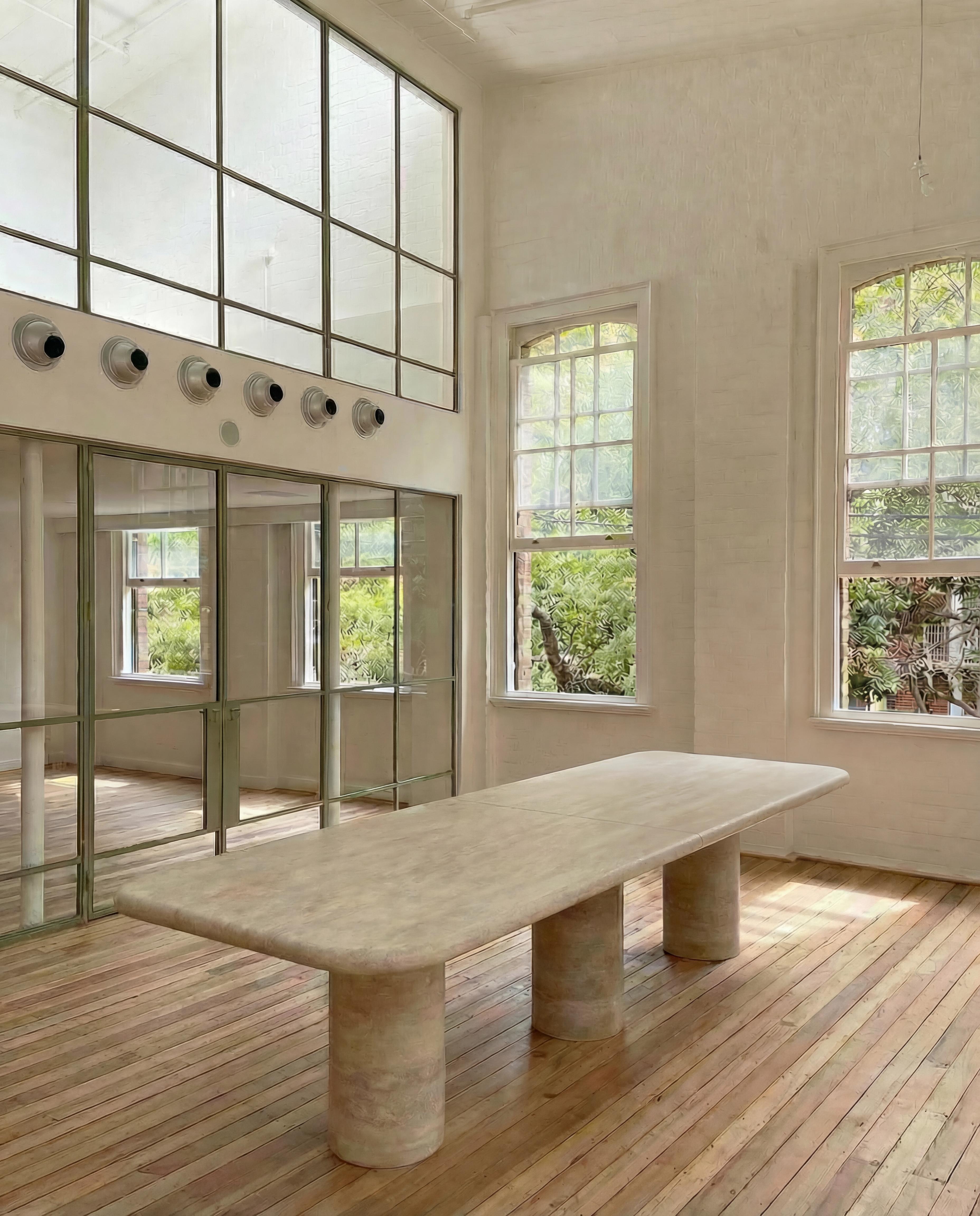 https://a.1stdibscdn.com/sculptural-large-travertine-dining-table-with-mario-bellini-style-column-legs-for-sale-picture-2/f_80522/f_424148521772508343213/Drift_Dining_Table_master.jpg