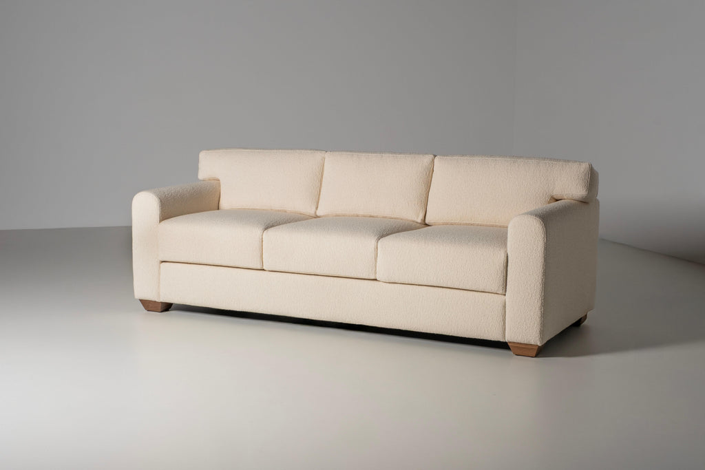 https://a.1stdibscdn.com/mid-century-modern-french-style-sofa-ivory-dedar-boucle-fabric-for-sale-picture-4/f_53532/f_462250221754934365104/E0029231_Export_master.jpg