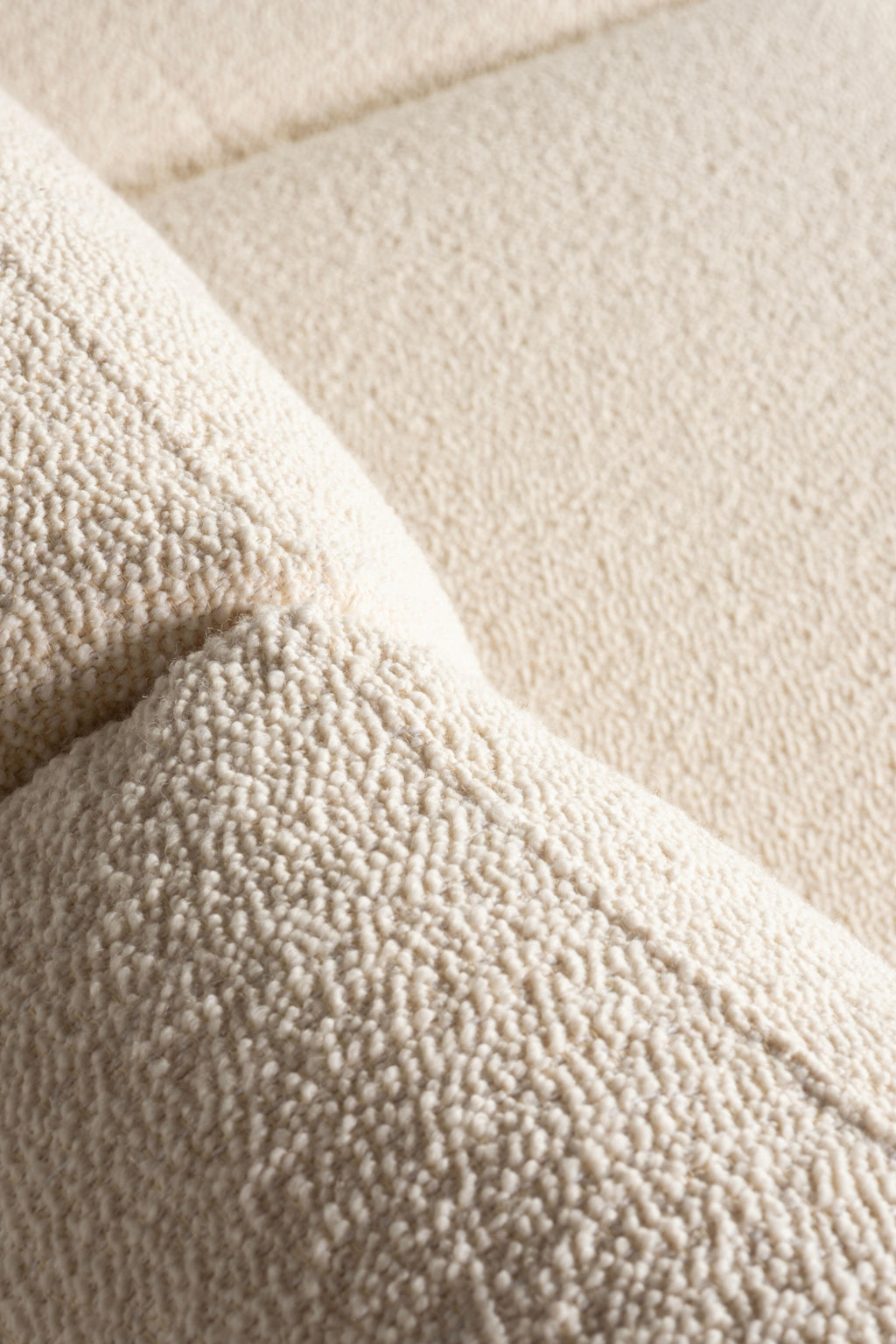 https://a.1stdibscdn.com/mid-century-modern-french-style-sofa-ivory-dedar-boucle-fabric-for-sale-picture-5/f_53532/f_462250221754934366070/E0029232_Export_master.jpg