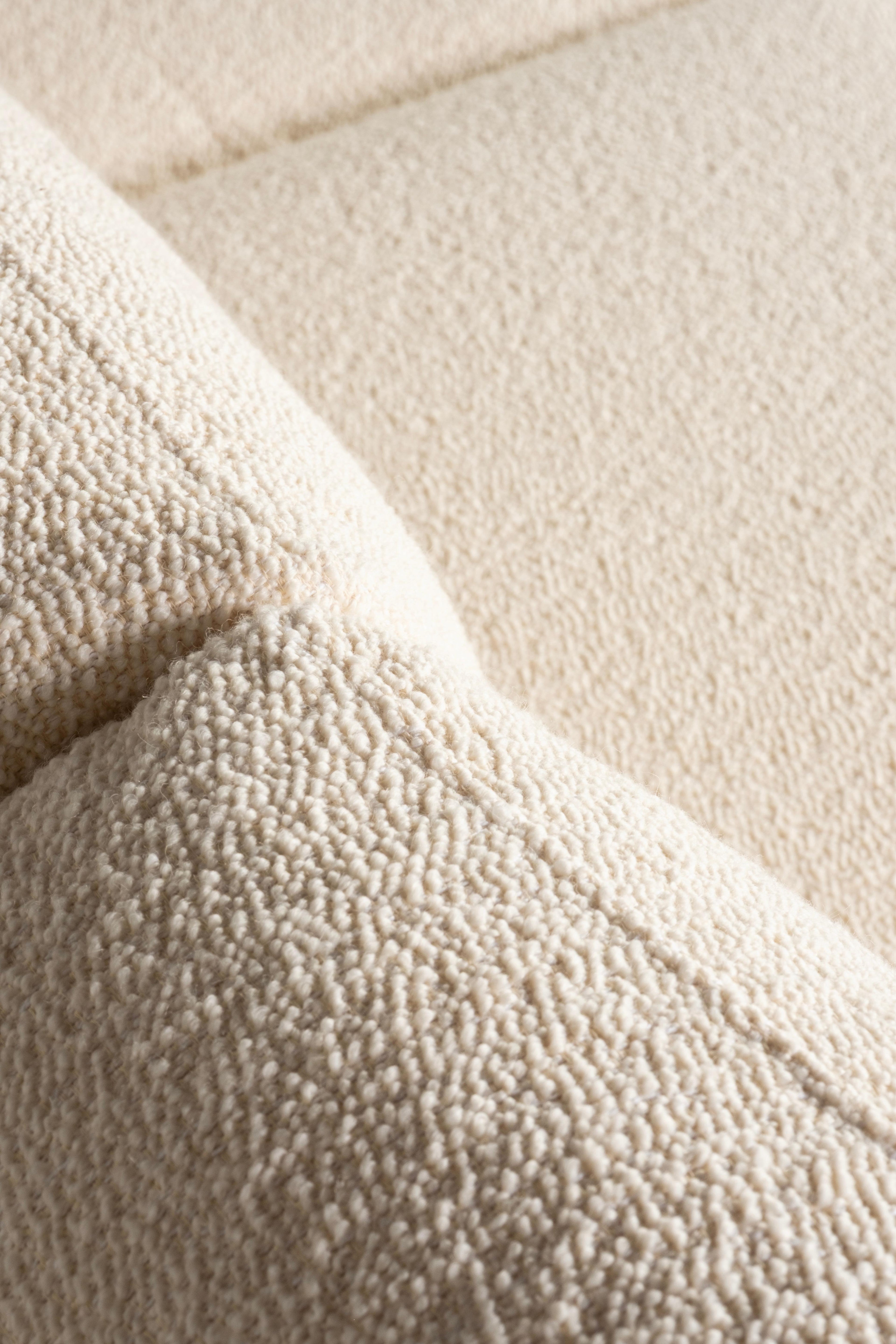 https://a.1stdibscdn.com/mid-century-modern-french-style-sofa-ivory-dedar-boucle-fabric-for-sale-picture-5/f_53532/f_462250221754934366070/E0029232_Export_master.jpg