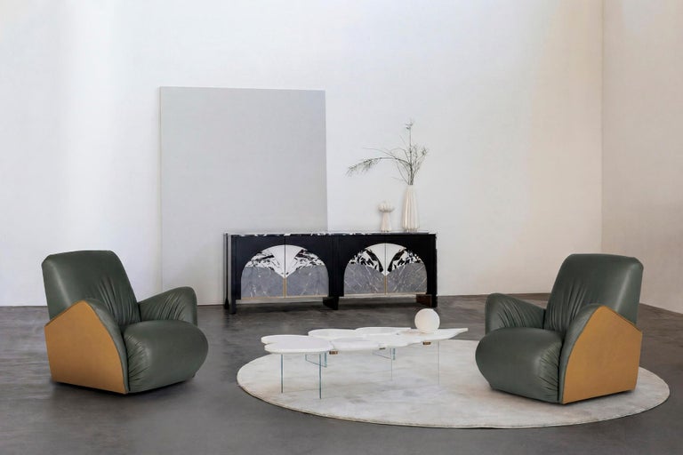 https://a.1stdibscdn.com/art-deco-caramulo-swivel-lounge-chair-camel-leather-handmade-by-greenapple-for-sale-picture-4/f_53532/f_386076021778053473133/E0032070_Export_master.jpg?width=768
