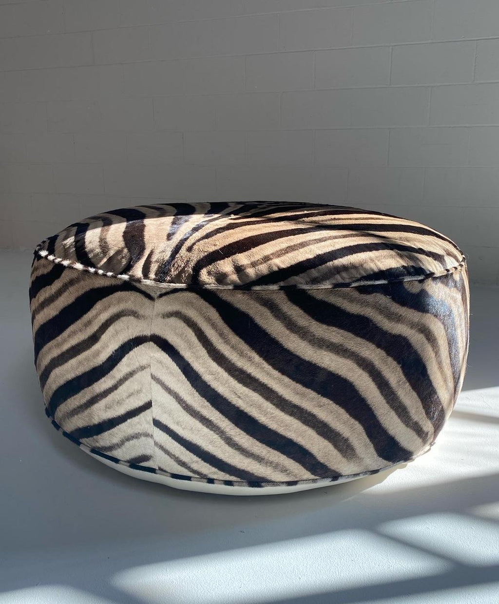 https://a.1stdibscdn.com/the-forsyth-cloud-ottoman-in-zebra-hide-for-sale-picture-8/f_17012/1609263767133/E48DE671_E10C_42B8_A918_CB67444E72F4_master.JPG