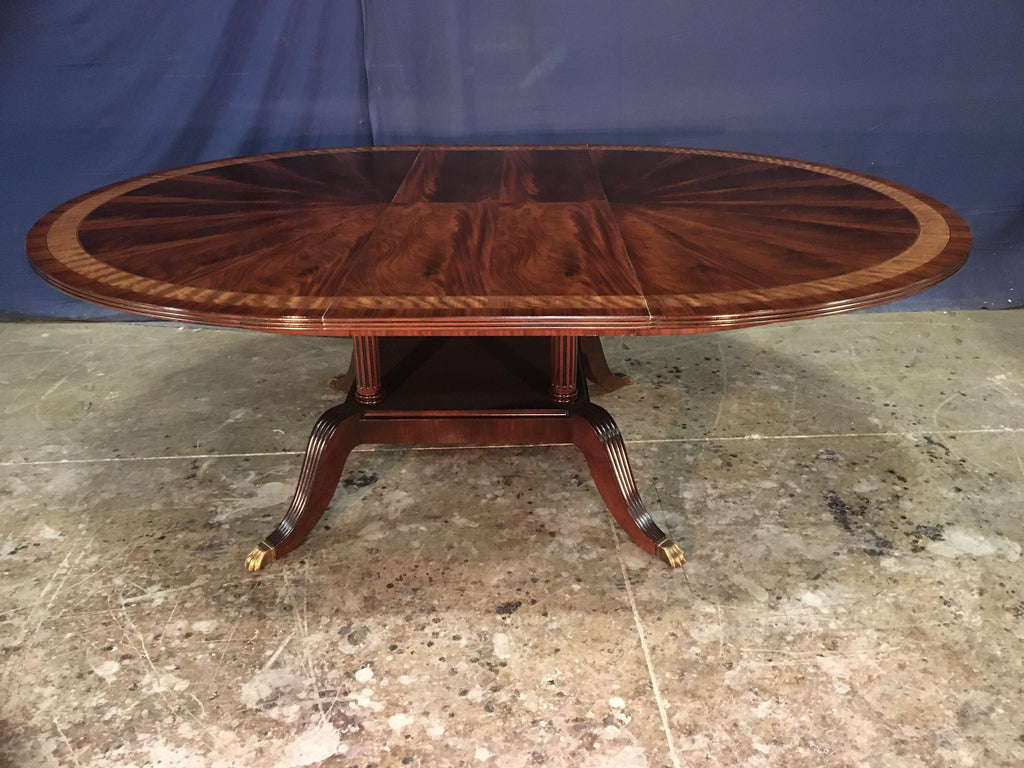 https://a.1stdibscdn.com/custom-round-mahogany-regency-style-dining-table-by-leighton-hall-for-sale-picture-2/f_44162/f_18023051/E86498A6_50D4_4DA6_8BA6_1582169394819_master.jpeg
