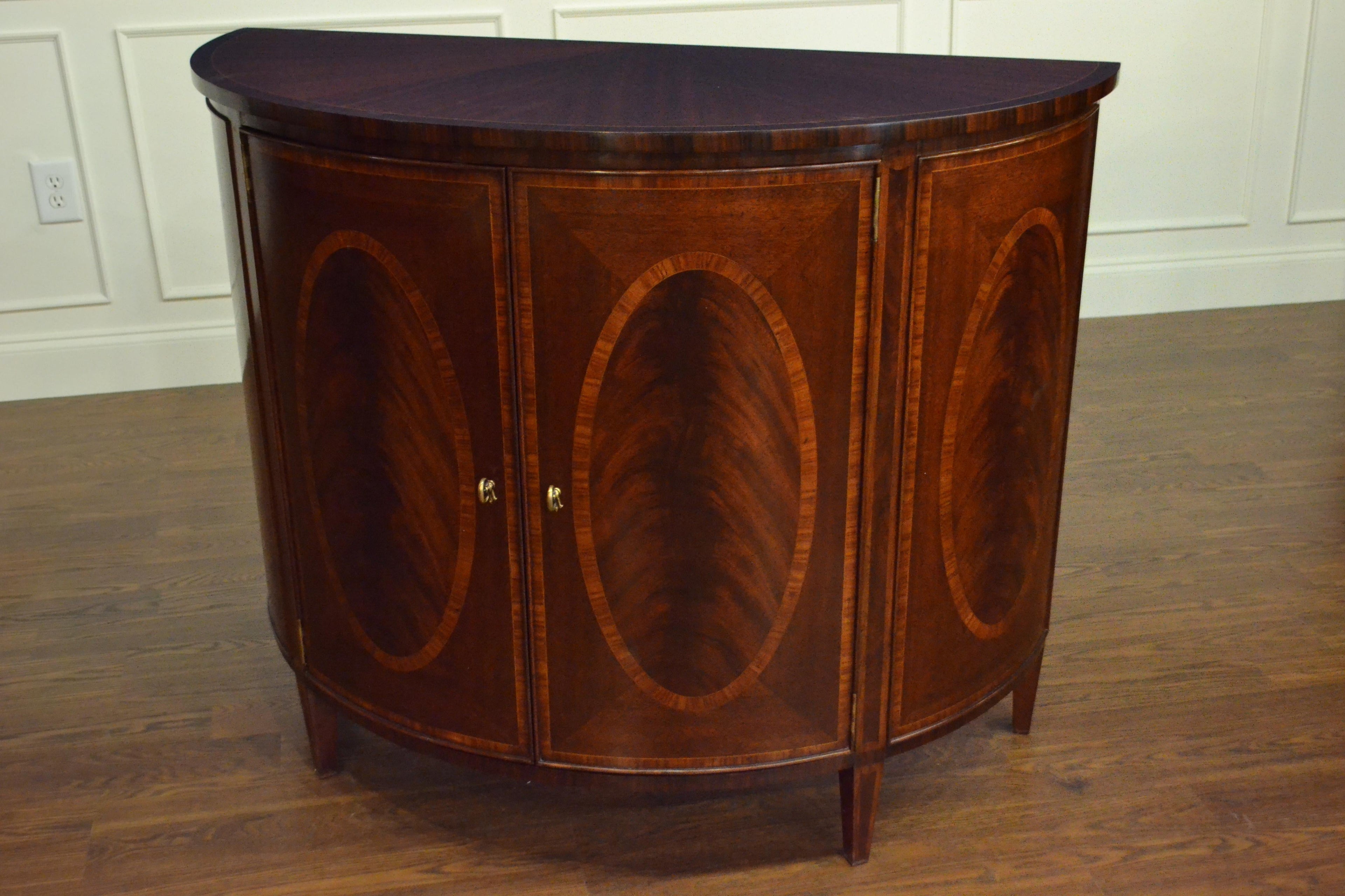 https://a.1stdibscdn.com/hepplewhite-style-mahogany-demilune-cabinet-by-leighton-hall-for-sale-picture-9/f_44162/f_154696221563149765921/ED34FE49_42CC_4DA3_9072_50515F22B4BF_master.jpeg