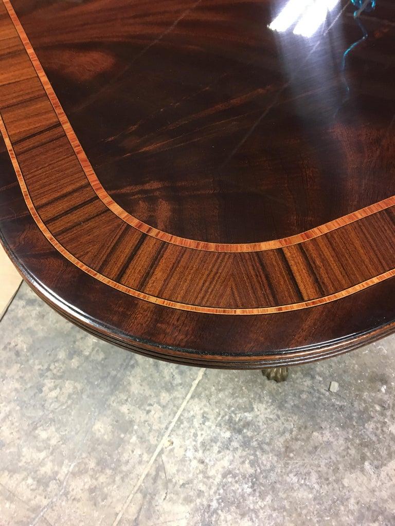 https://a.1stdibscdn.com/custom-multi-banded-mahogany-georgian-style-dining-table-by-leighton-hall-for-sale-picture-8/f_44162/f_173475721577241781291/EE5DAAA5_43BD_4B3D_9690_3E1DDC96776A_master.jpeg