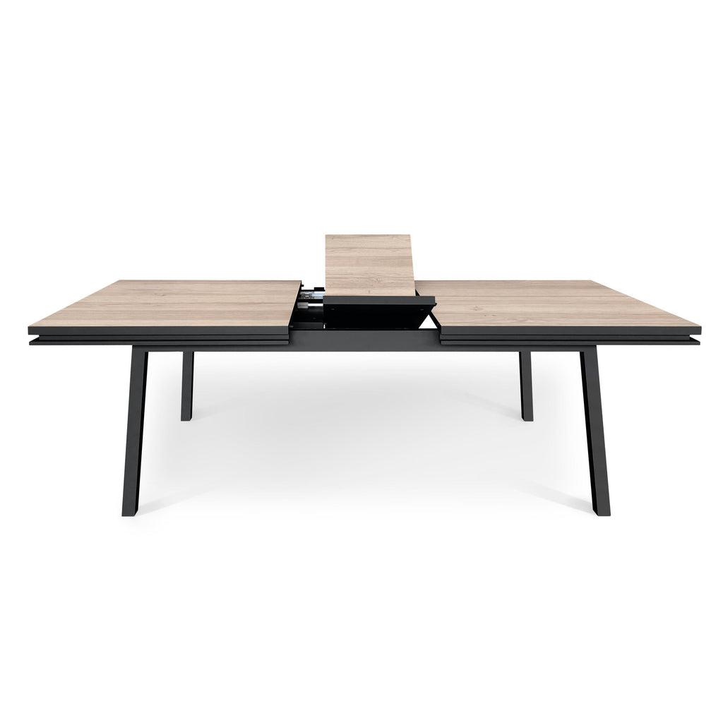 https://a.1stdibscdn.com/rectangular-extensible-dining-table-in-solid-oak-design-by-eric-gizard-paris-for-sale-picture-3/f_57342/f_256705421633962874426/EG2_010CNO1800100_2_Table_repas_ch_ne_1_allonge_semi_d_pli_e_3000x3000_master.jpg