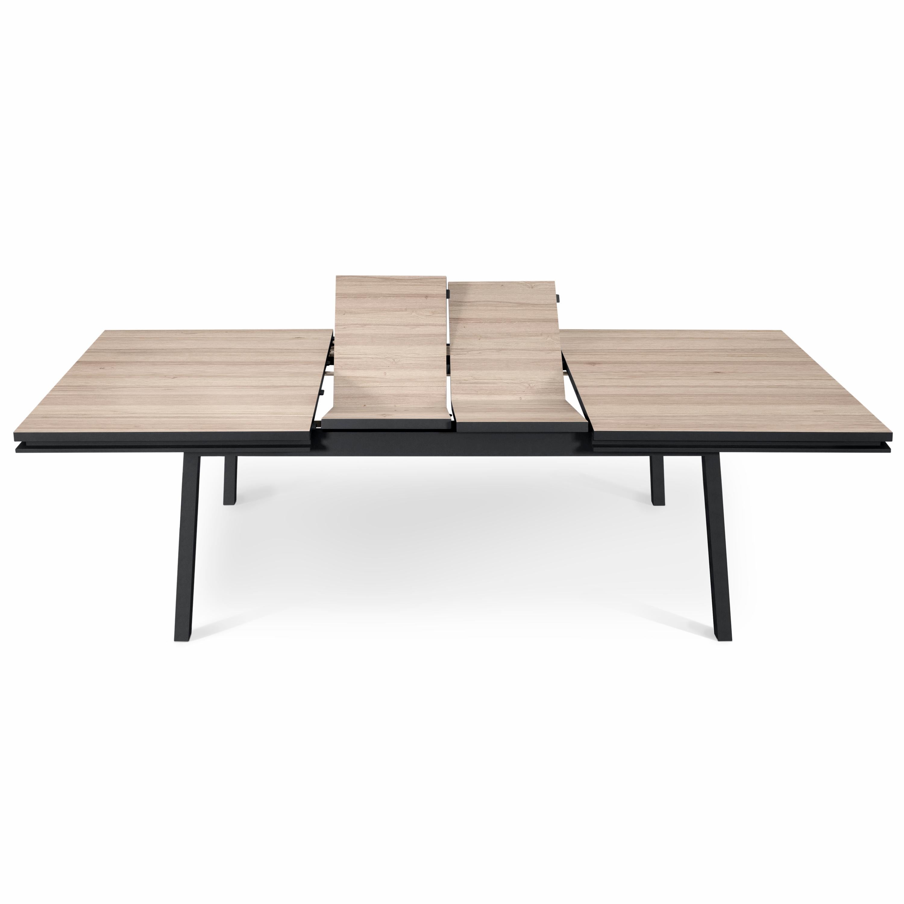 https://a.1stdibscdn.com/rectangular-extensible-dining-table-in-solid-oak-design-by-eric-gizard-paris-for-sale-picture-4/f_57342/f_256705421633962878685/EG2_010CNO1800100_2_Table_repas_ch_ne_2_allonges_semi_d_pli_es_3000x3000_master.jpg