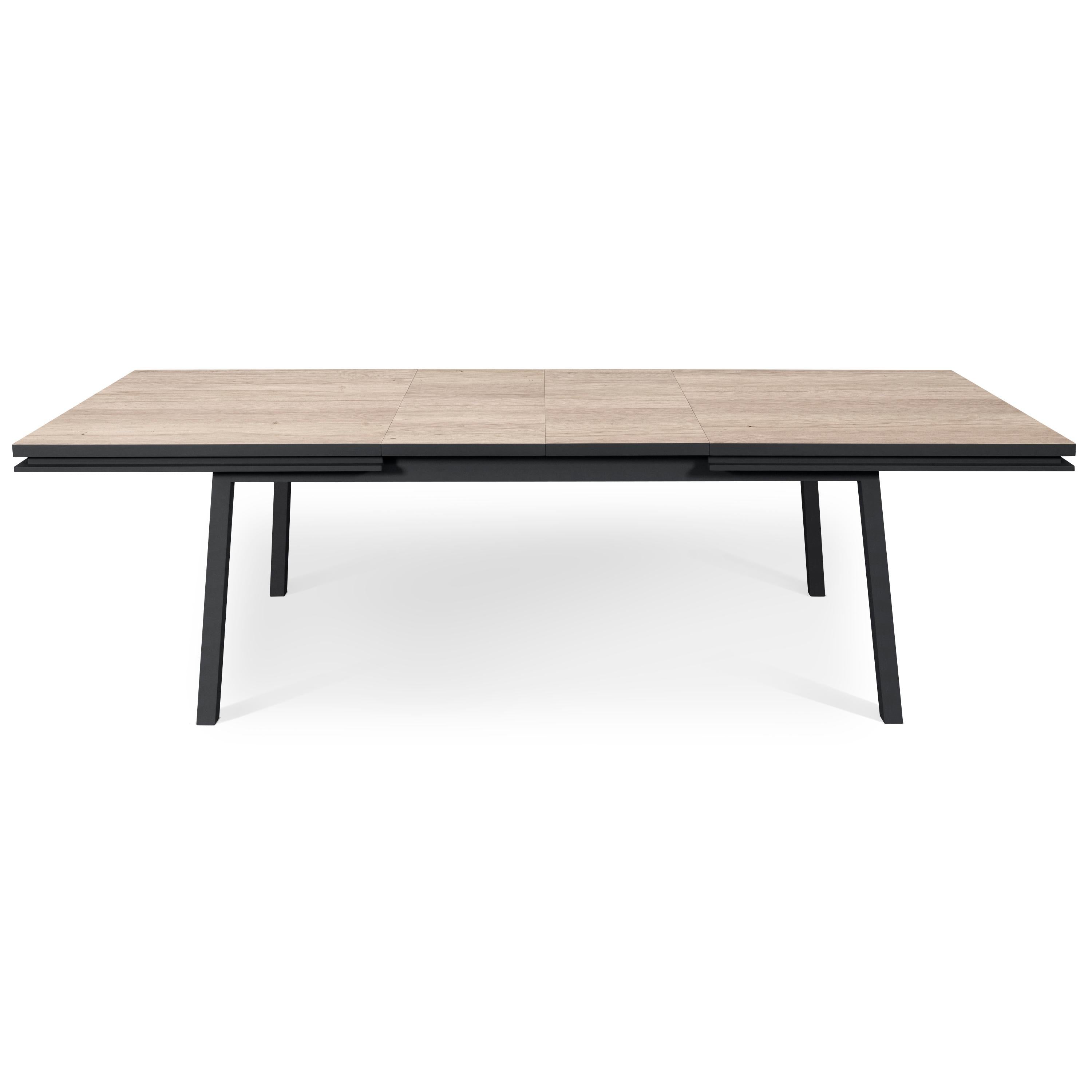 https://a.1stdibscdn.com/rectangular-extensible-dining-table-in-solid-oak-design-by-eric-gizard-paris-for-sale-picture-2/f_57342/f_256705421633962868649/EG2_010CNO1800100_2_Table_repas_ch_ne_profil_2_allonges_3000x3000_master.jpg