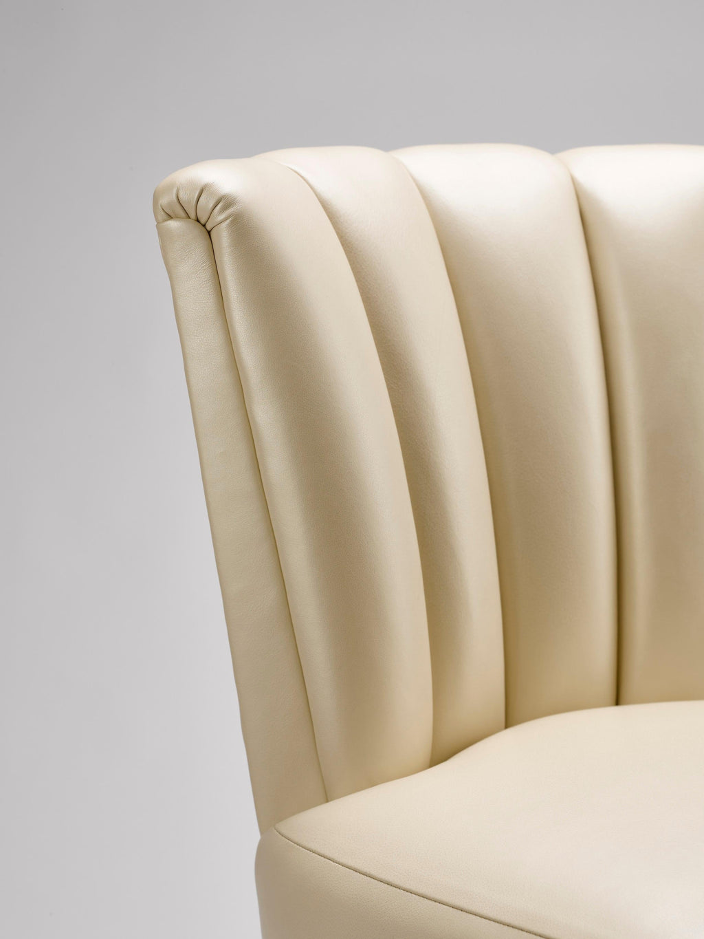 https://a.1stdibscdn.com/contemporary-elodie-dining-chair-in-champagne-pearlized-leather-with-walnut-legs-for-sale-picture-4/f_27813/f_236558121620308078508/ELODIE_DINING_CHAIR_4_master.jpg