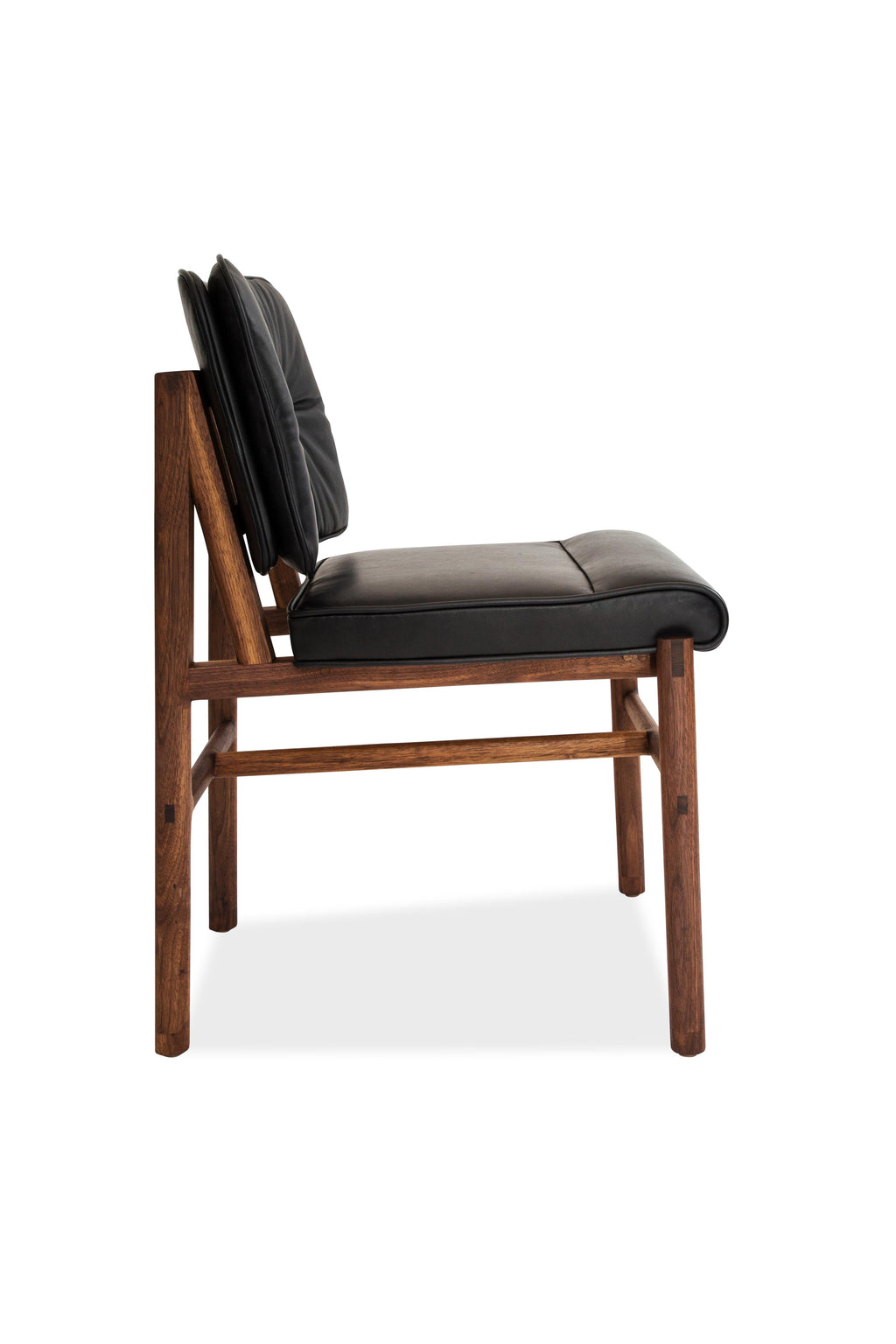 https://a.1stdibscdn.com/earl-walnut-black-leather-moresby-dining-chair-for-sale-picture-3/f_24193/f_235171821619296073628/Earl_2Chairs_11_master.jpg