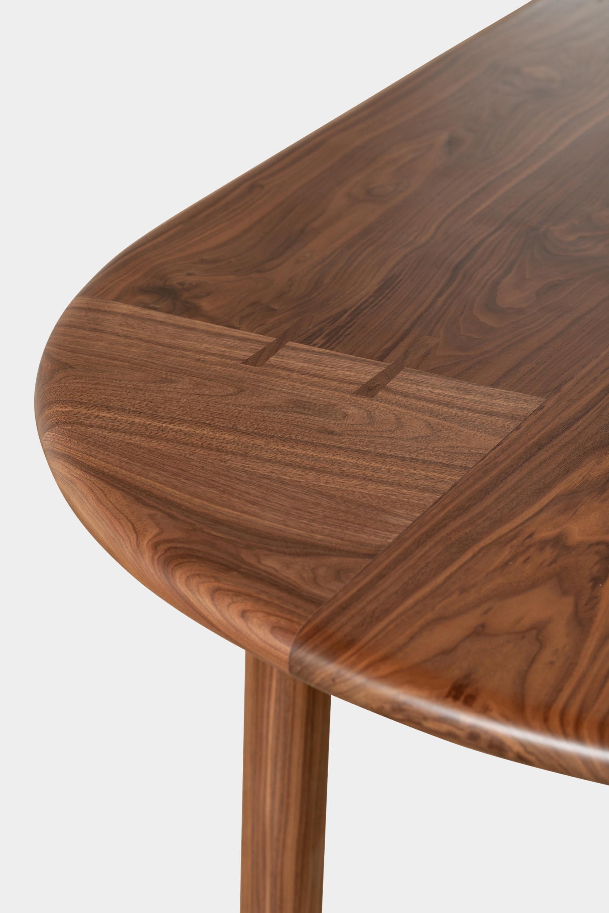 https://a.1stdibscdn.com/pill-top-9ft-long-palang-dining-table-in-walnut-for-sale-picture-6/f_24193/f_295775121657839227131/Earl_Home_0537_master.jpg