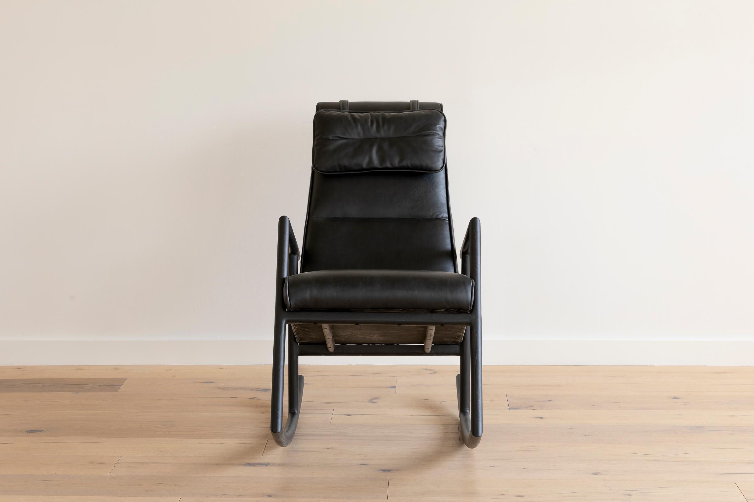 https://a.1stdibscdn.com/earl-ebonized-oak-black-leather-moresby-rocking-chair-for-sale-picture-2/f_24193/f_234473421618864436355/Earl_Home_2304_master.jpg