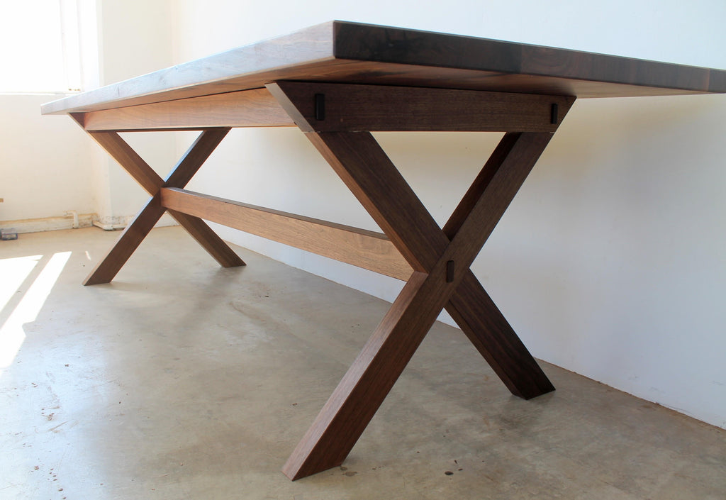 https://a.1stdibscdn.com/east-end-trestle-table-in-walnut-for-sale-picture-3/f_49771/f_228378221615668431319/East_End_Trestle_Walnut_3_master.JPG
