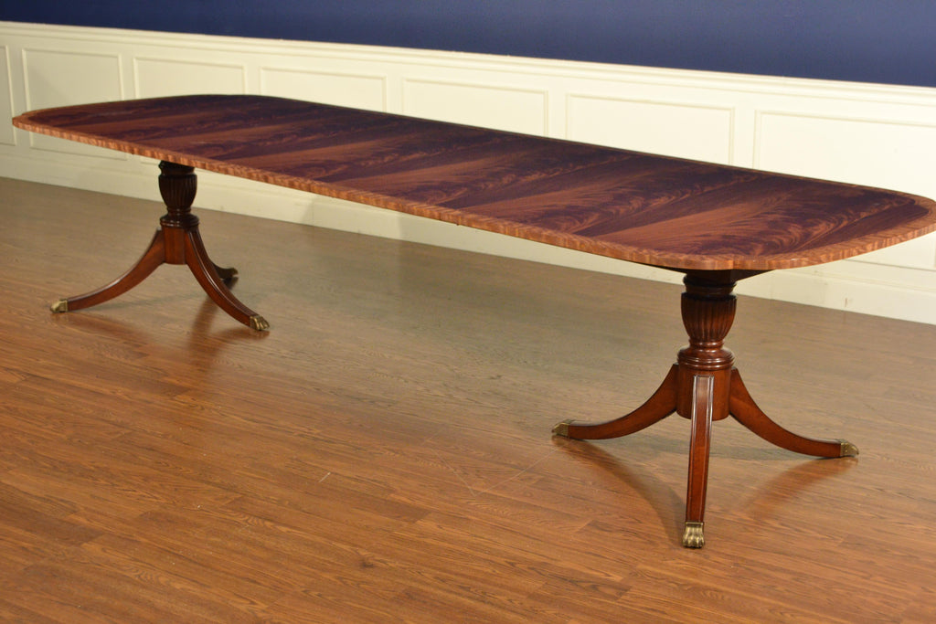 https://a.1stdibscdn.com/traditional-mahogany-scallop-cornered-dining-table-by-leighton-hall-for-sale-picture-3/17186662/f_178381711580915071259/Ebay22_073_master.JPG