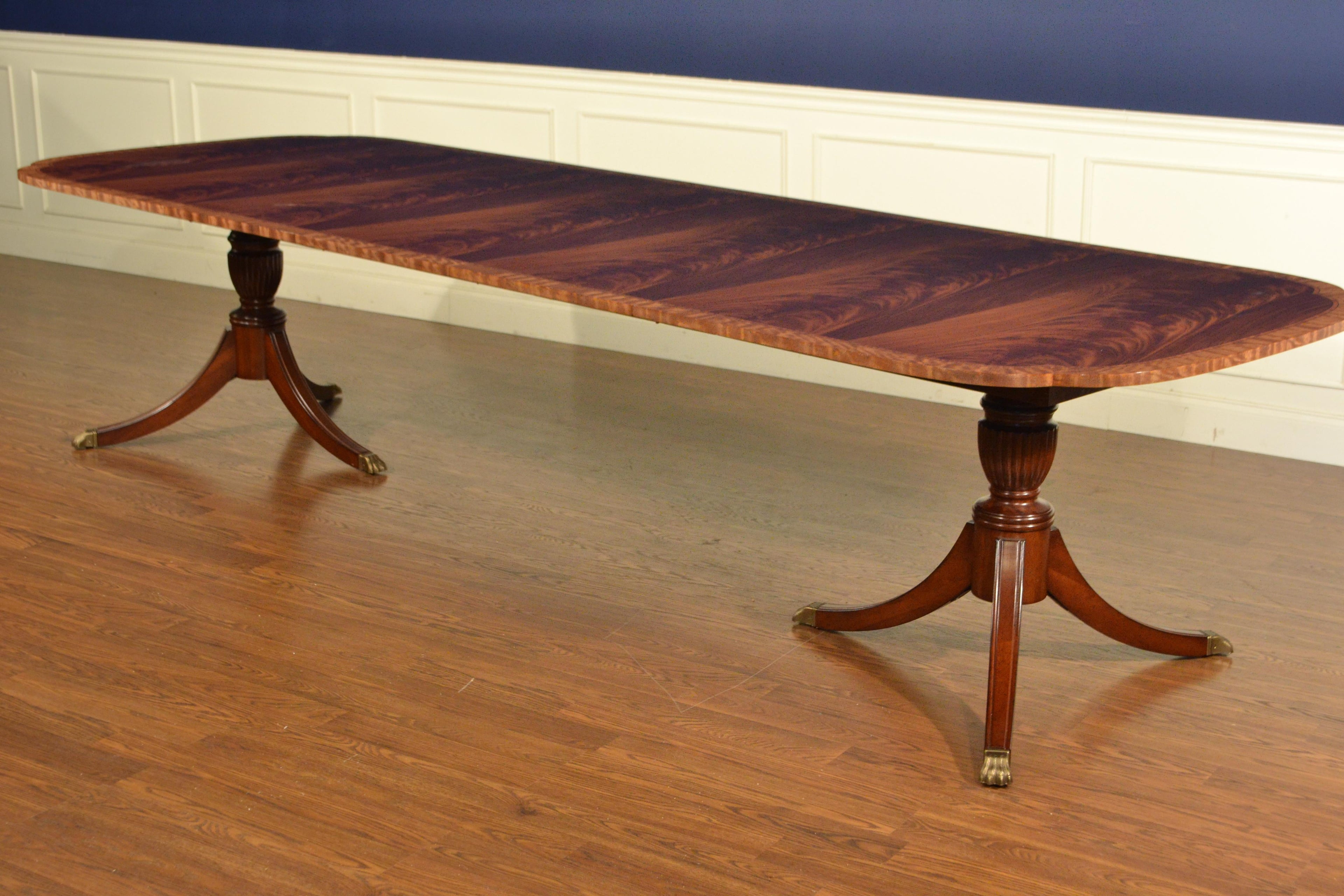 https://a.1stdibscdn.com/traditional-mahogany-scallop-cornered-dining-table-by-leighton-hall-for-sale-picture-3/17186662/f_178381711580915071259/Ebay22_073_master.JPG