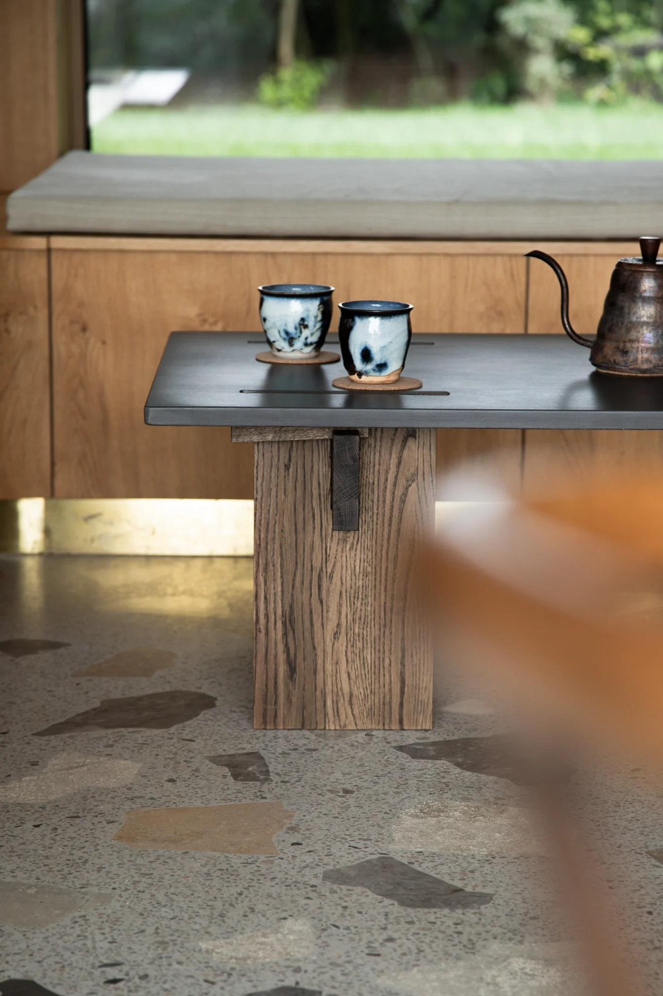 https://a.1stdibscdn.com/arnold-dark-concrete-top-and-dark-oak-legs-coffee-table-by-eberhart-furniture-for-sale-picture-4/f_12192/f_478369221764874844315/Eberhart_Furniture_ARNL_LP_Sm_010__master.jpg