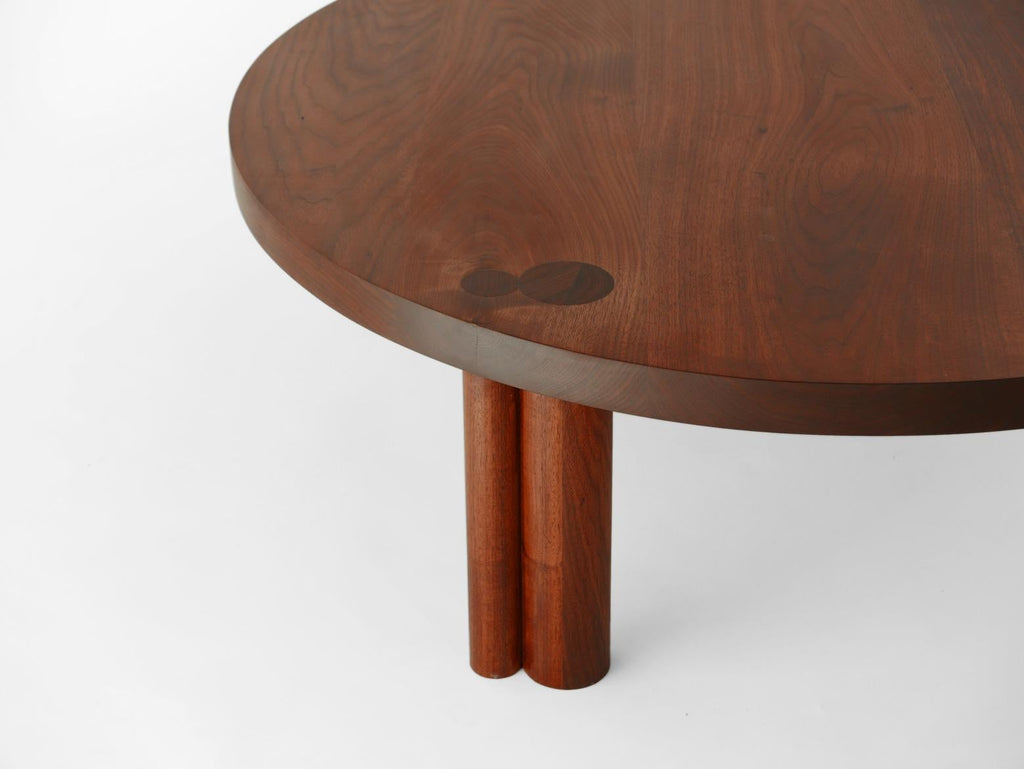 https://a.1stdibscdn.com/ecliptic-48-round-coffee-table-in-american-black-walnut-and-ceramic-legs-for-sale-picture-4/f_31443/f_139918421552428297993/Ecliptic_doublleg_detail_lores_master.jpg