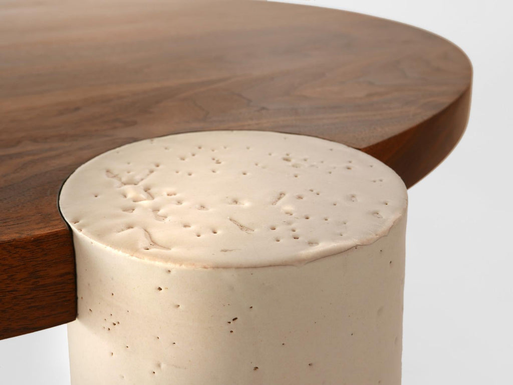 https://a.1stdibscdn.com/coffee-table-in-black-walnut-with-ceramic-and-solid-wood-legs-medium-sized-for-sale-picture-3/f_31443/f_225685821613507045543/Ecliptic_white_ceramic_leg_detail_lores_master.jpg
