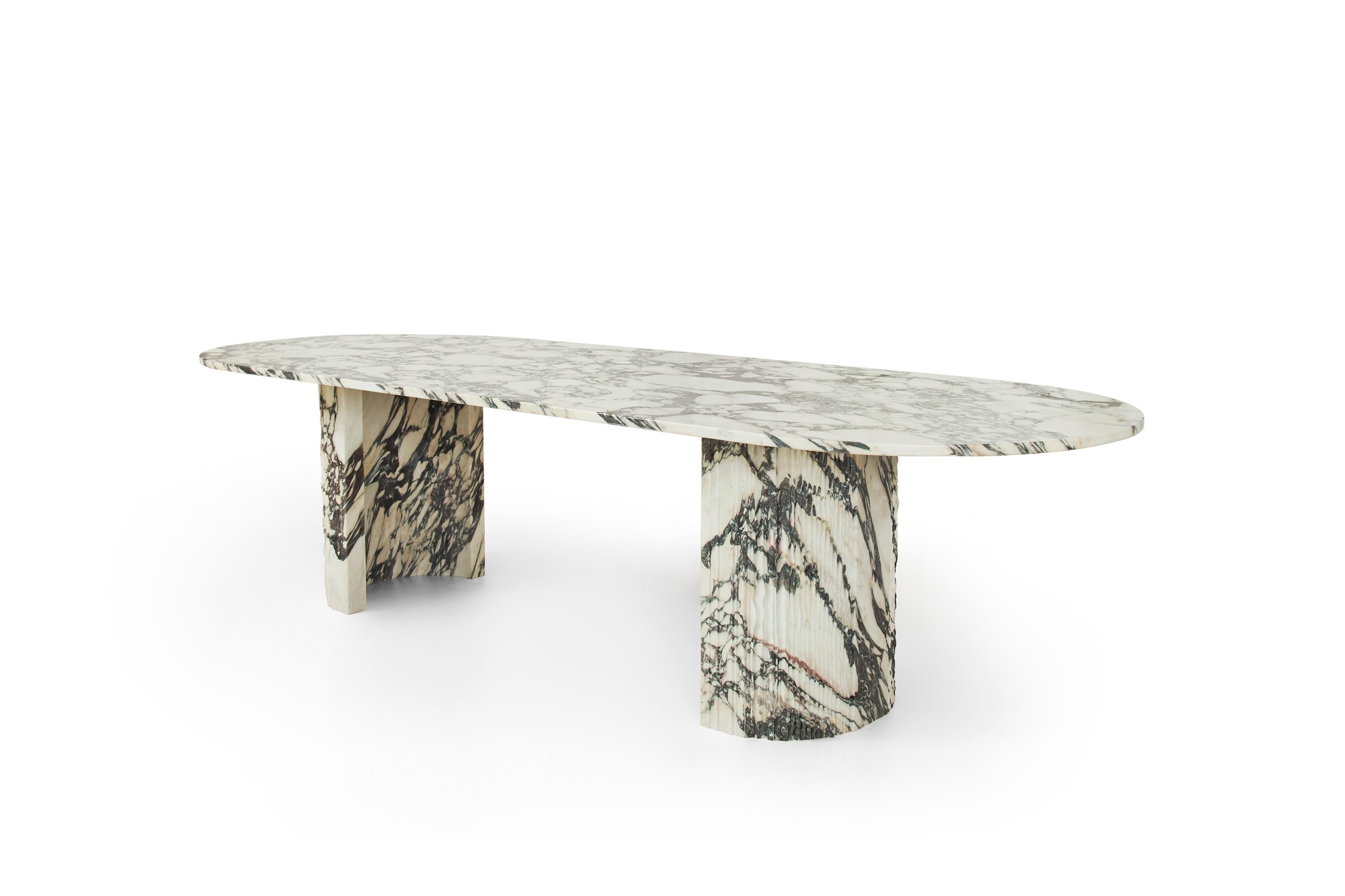 https://a.1stdibscdn.com/sculpted-brescia-marble-table-by-omar-chakil-for-sale-picture-3/f_12192/f_332938821678821194920/Elia_Dining_angle_master.jpg