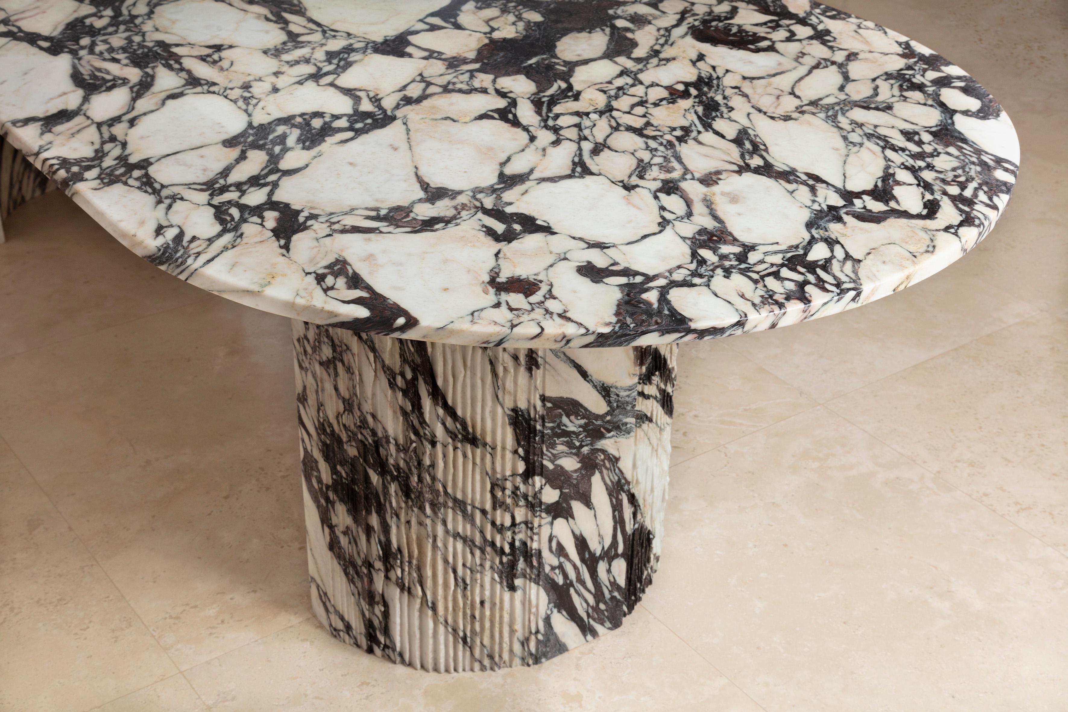 https://a.1stdibscdn.com/sculpted-brescia-marble-table-by-omar-chakil-for-sale-picture-4/f_12192/f_332938821678821195767/Elia_Dining_edge_master.jpg