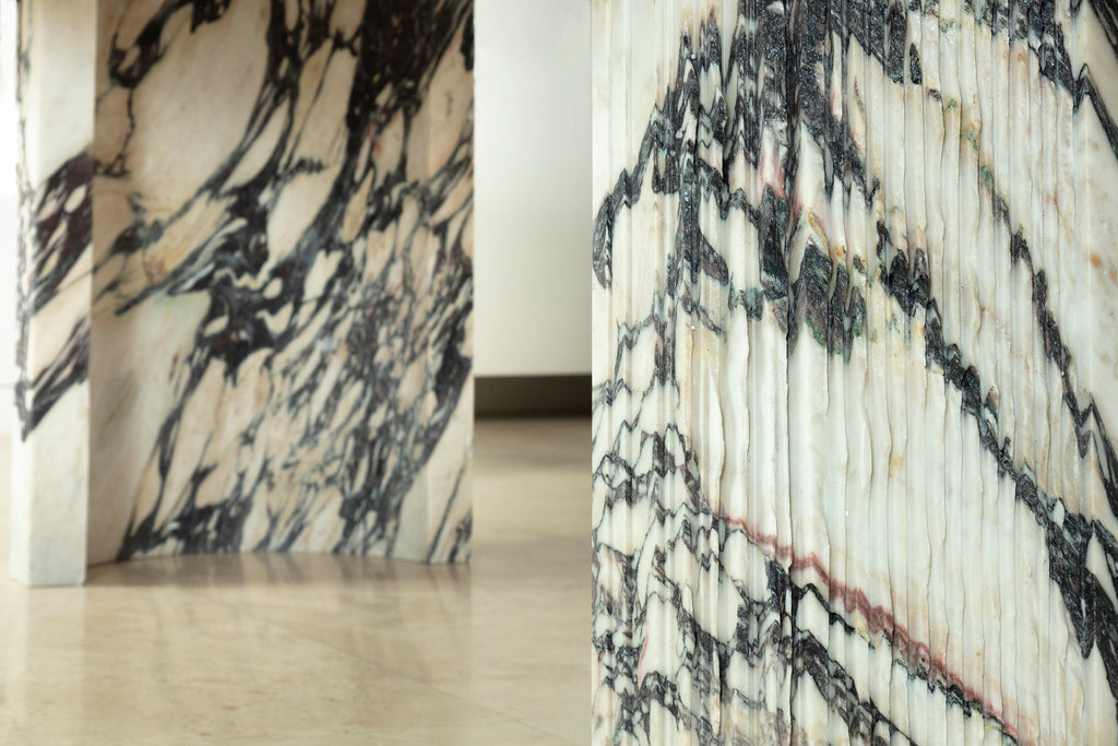 https://a.1stdibscdn.com/sculpted-brescia-marble-table-by-omar-chakil-for-sale-picture-2/f_12192/f_332938821678821194097/Elia_dining_2_1__master.jpg