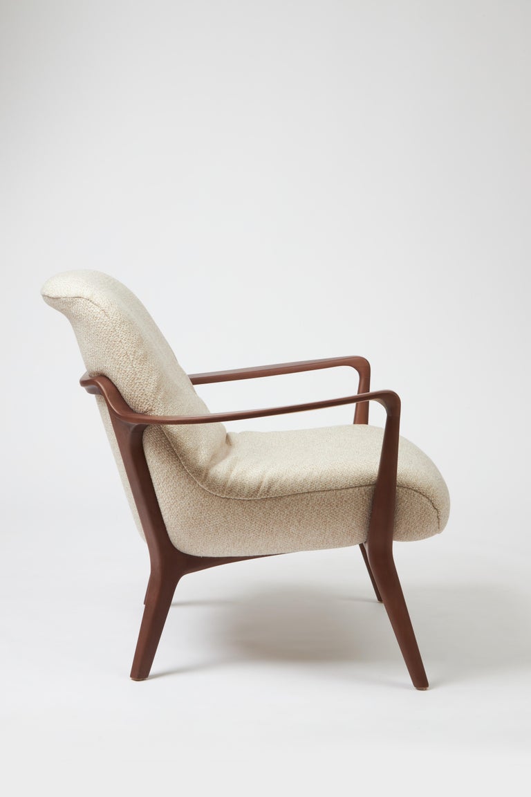 https://a.1stdibscdn.com/minimal-style-insigne-armchair-sculpted-in-walnut-wood-finish-textiles-seating-for-sale-picture-4/f_35593/f_391247321712182112542/Emp_rio_das_Cadeiras0733_master.jpg?width=768