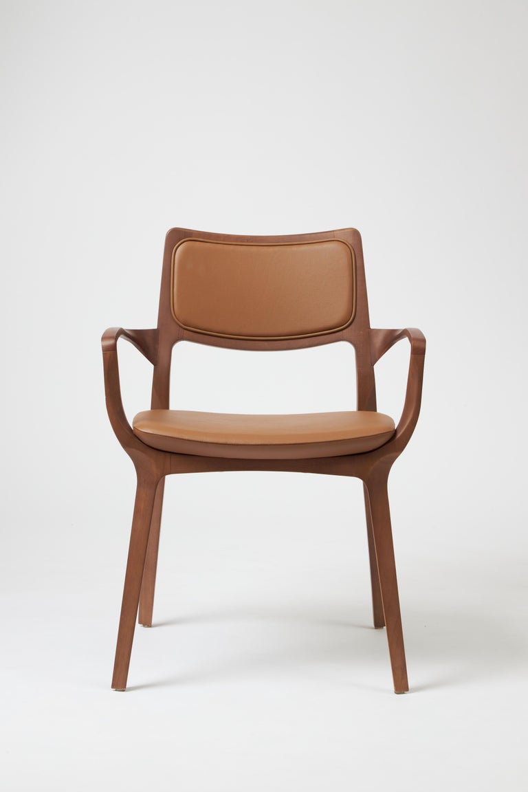 https://a.1stdibscdn.com/modern-style-aurora-chair-sculpted-in-walnut-finish-arms-leather-back-seating-for-sale-picture-2/f_35593/f_390206321711487543876/Emp_rio_das_Cadeiras0756_master.jpg?width=768