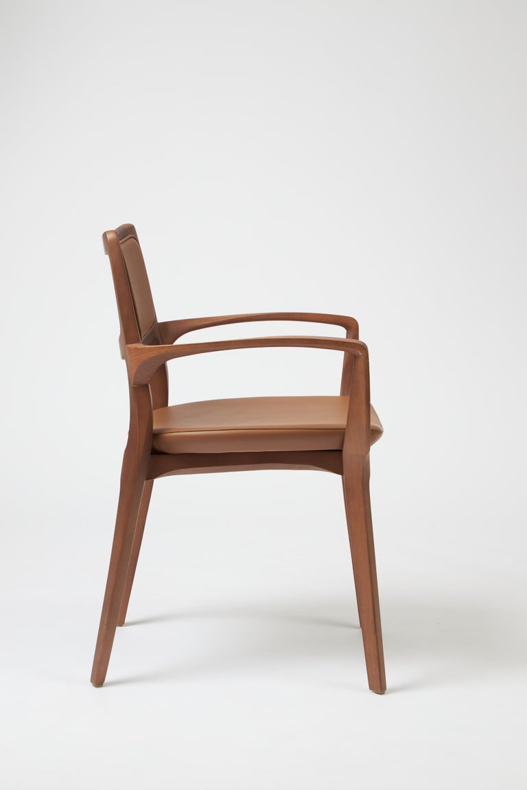 https://a.1stdibscdn.com/modern-style-aurora-chair-sculpted-in-walnut-finish-arms-leather-back-seating-for-sale-picture-5/f_35593/f_390206321711487466135/Emp_rio_das_Cadeiras0758_master.jpg?width=768