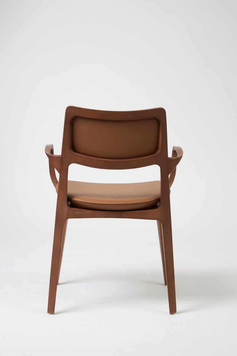https://a.1stdibscdn.com/modern-style-aurora-chair-sculpted-in-walnut-finish-arms-leather-back-seating-for-sale-picture-4/f_35593/f_390206321711487465150/Emp_rio_das_Cadeiras0759_master.jpg?width=768