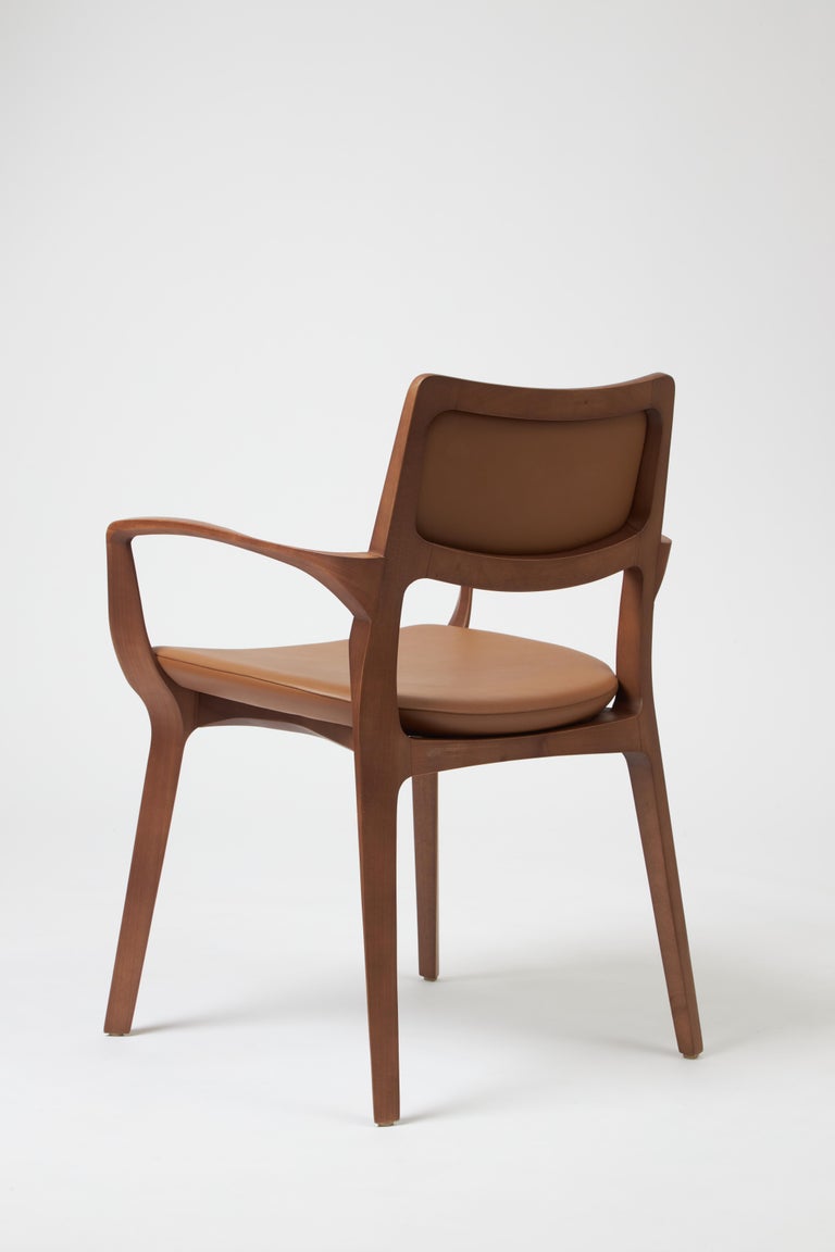 https://a.1stdibscdn.com/modern-style-aurora-chair-sculpted-in-walnut-finish-arms-leather-back-seating-for-sale-picture-3/f_35593/f_390206321711487464192/Emp_rio_das_Cadeiras0760_master.jpg?width=768