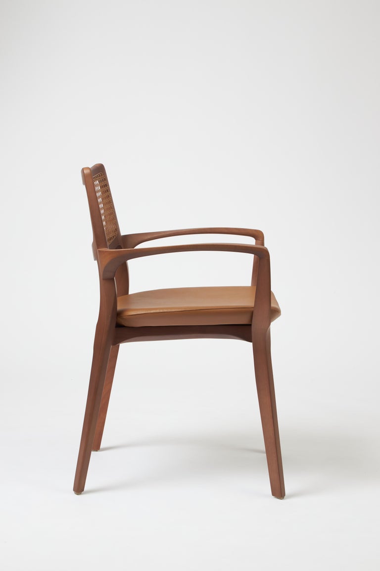 https://a.1stdibscdn.com/modern-style-aurora-chair-sculpted-in-walnut-finish-arms-leather-seating-cane-for-sale-picture-3/f_35593/f_390205621711486897524/Emp_rio_das_Cadeiras0763_master.jpg?width=768