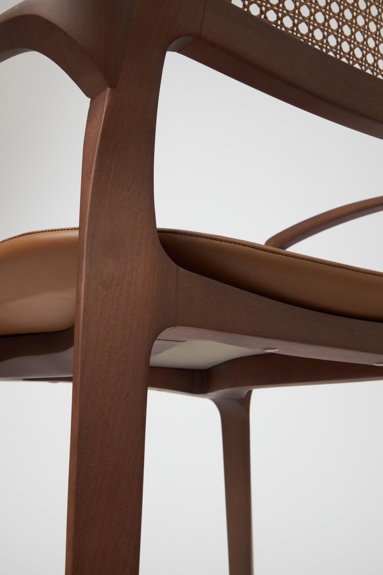 https://a.1stdibscdn.com/modern-style-aurora-chair-sculpted-in-walnut-finish-arms-leather-back-seating-for-sale-picture-8/f_35593/f_390205821711487110417/Emp_rio_das_Cadeiras0768_master.jpg?width=768