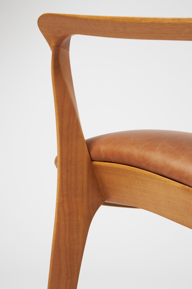 https://a.1stdibscdn.com/modern-style-aurora-armchair-sculpted-in-solid-wood-caning-back-leather-seat-for-sale-picture-11/f_35593/f_390931821711998923209/Emp_rio_das_Cadeiras0816_master.jpg?width=768