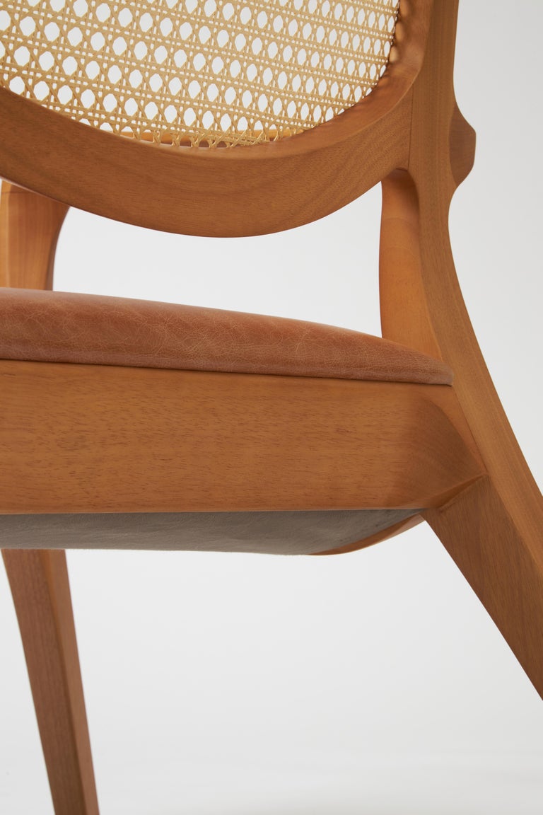 https://a.1stdibscdn.com/modern-style-aurora-armchair-sculpted-in-solid-wood-caning-back-leather-seat-for-sale-picture-9/f_35593/f_390931821711998921278/Emp_rio_das_Cadeiras0818_master.jpg?width=768