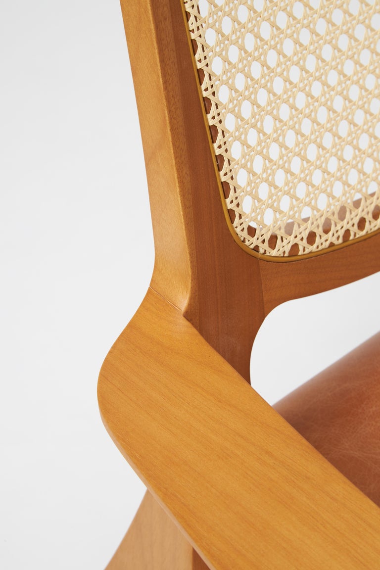 https://a.1stdibscdn.com/modern-style-aurora-armchair-sculpted-in-solid-wood-caning-back-leather-seat-for-sale-picture-7/f_35593/f_390931821711998921038/Emp_rio_das_Cadeiras0821_master.jpg?width=768