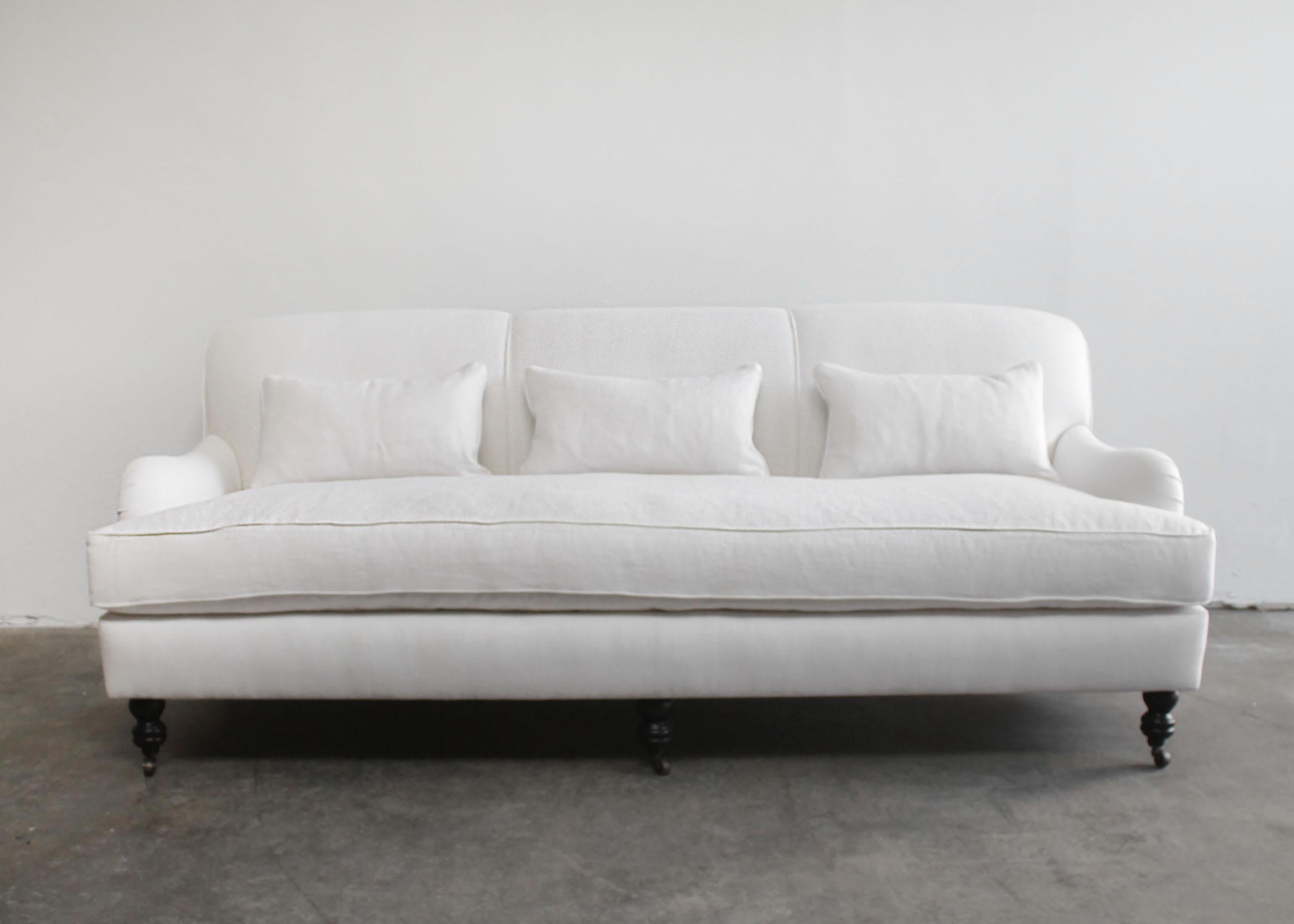 https://a.1stdibscdn.com/custom-made-white-linen-english-arm-rolled-back-sofa-with-casters-for-sale-picture-2/f_18223/f_280593421648854711873/EnglishaArmSofa2_master.jpg