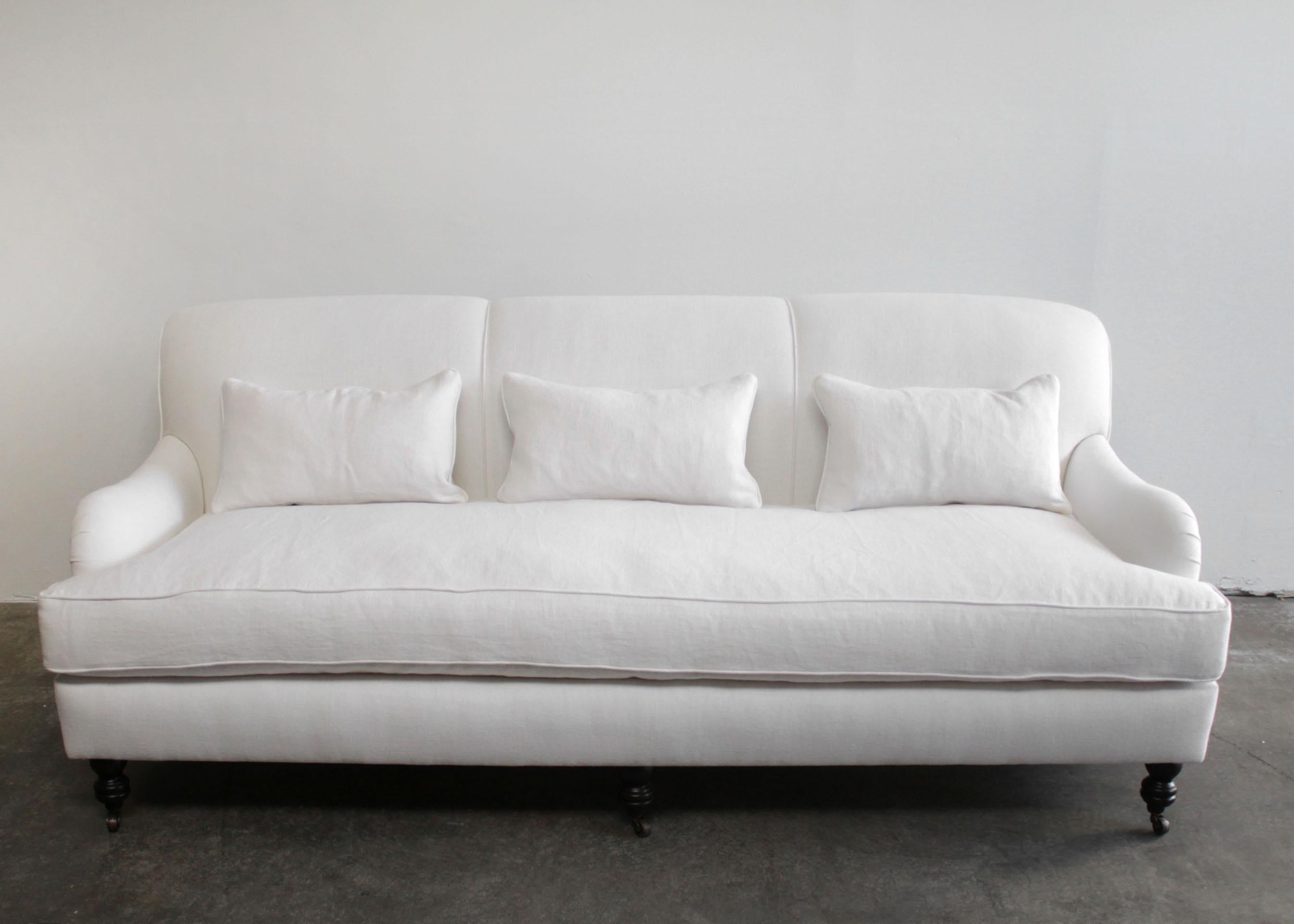 https://a.1stdibscdn.com/custom-made-white-linen-english-arm-rolled-back-sofa-with-casters-for-sale-picture-3/f_18223/f_280593421648854712502/EnglishaArmSofa3_master.jpg