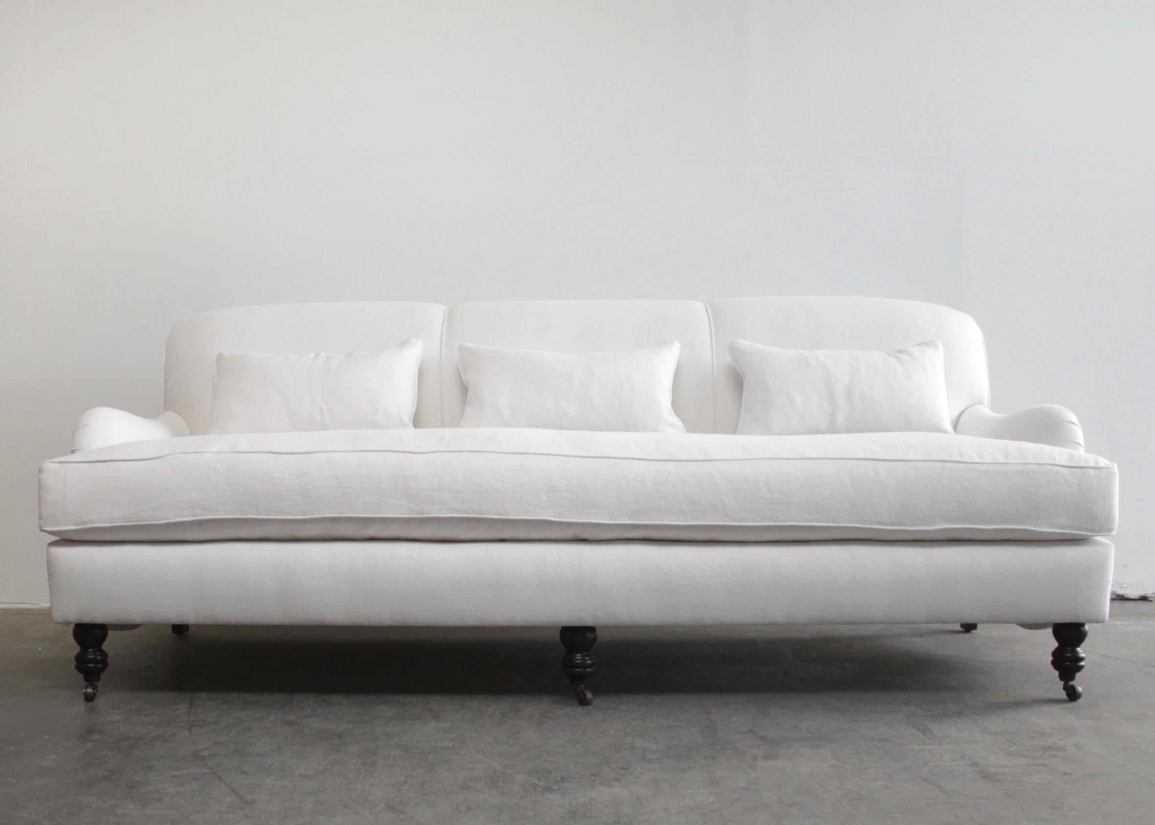 https://a.1stdibscdn.com/custom-made-white-linen-english-arm-rolled-back-sofa-with-casters-for-sale-picture-4/f_18223/f_280593421648854713039/EnglishaArmSofa4_master.jpg