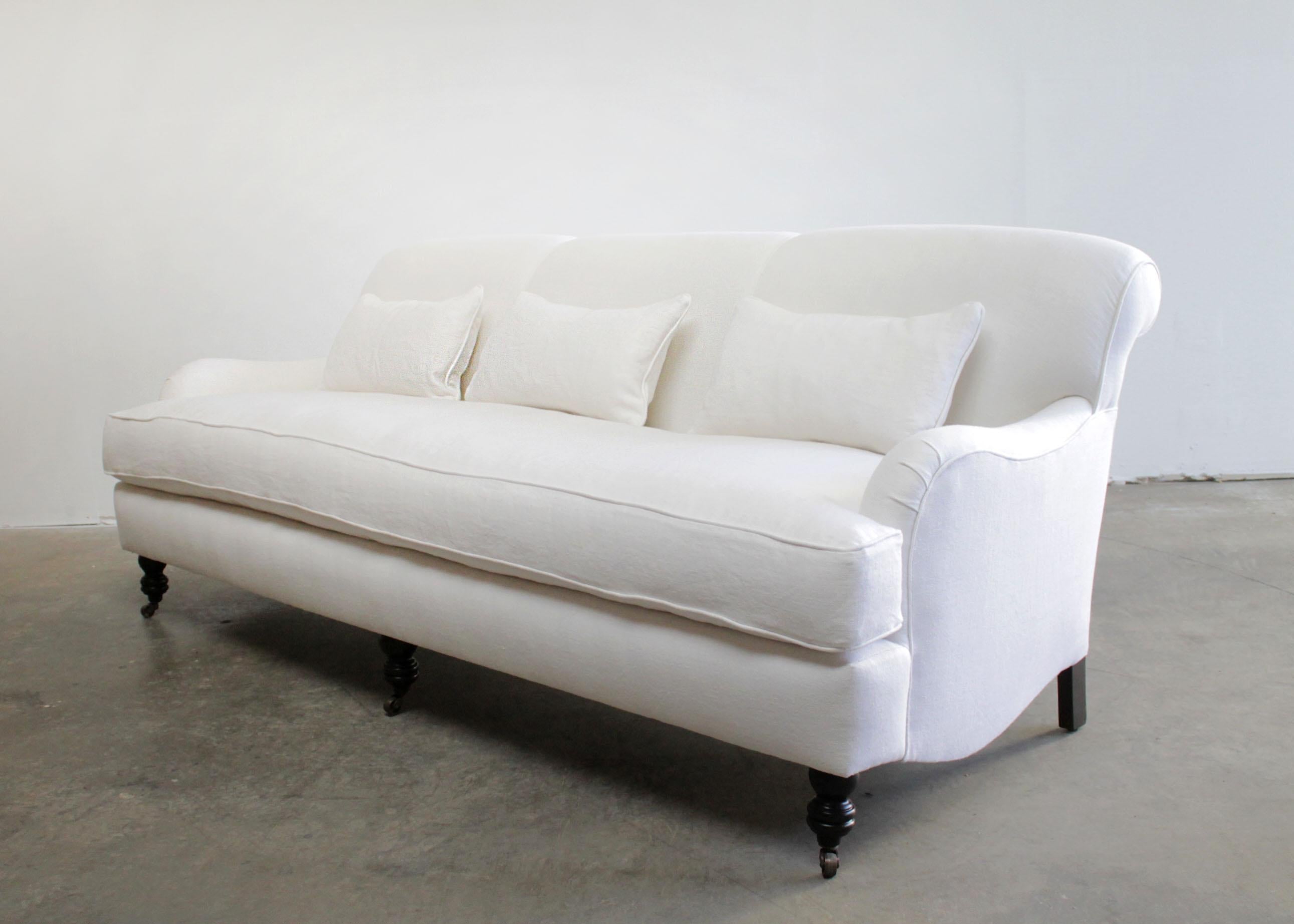 https://a.1stdibscdn.com/custom-made-white-linen-english-arm-rolled-back-sofa-with-casters-for-sale-picture-5/f_18223/f_280593421648854713606/EnglishaArmSofa5_master.jpg