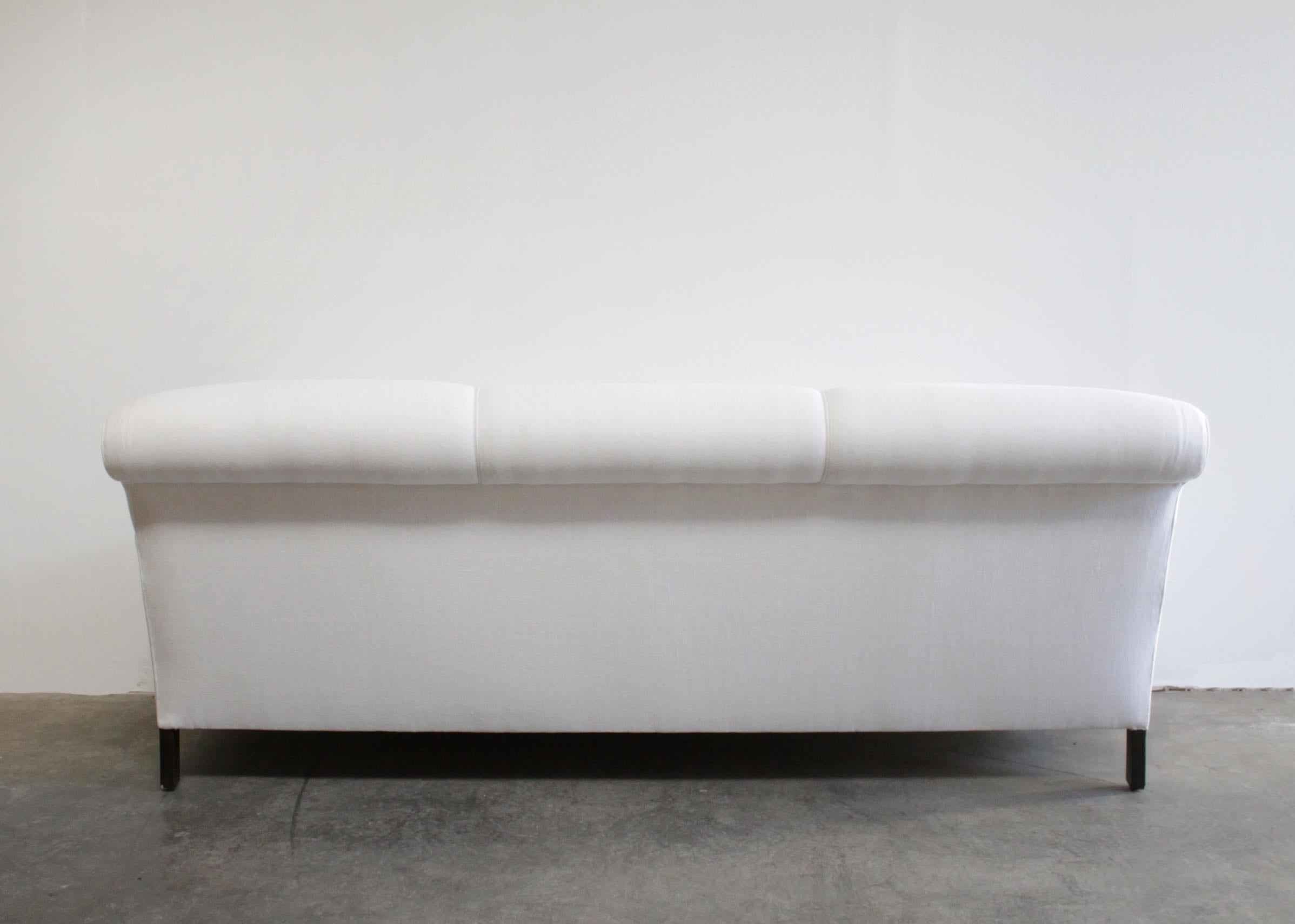 https://a.1stdibscdn.com/custom-made-white-linen-english-arm-rolled-back-sofa-with-casters-for-sale-picture-7/f_18223/f_280593421648854714950/EnglishaArmSofa7_master.jpg