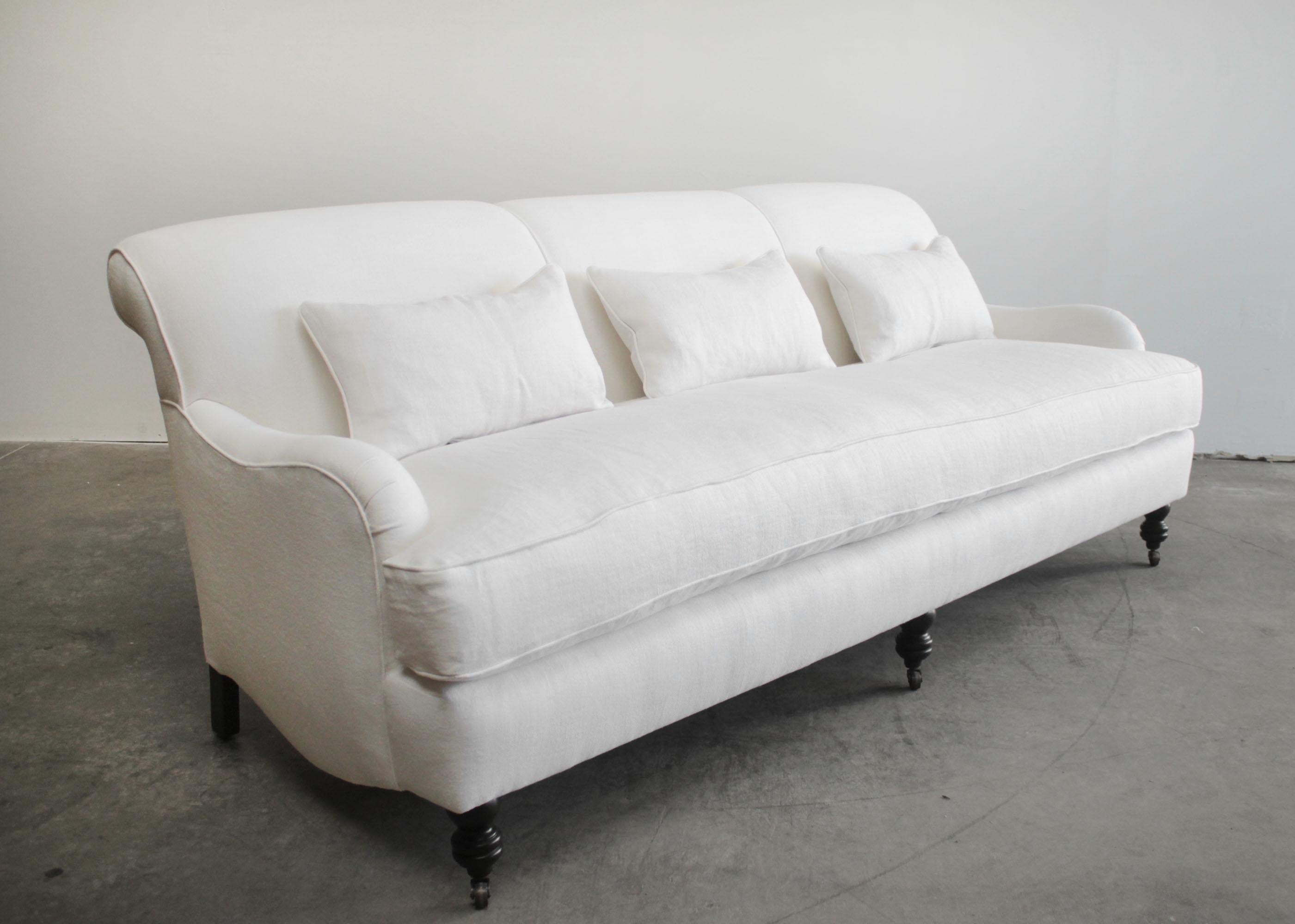 https://a.1stdibscdn.com/custom-made-white-linen-english-arm-rolled-back-sofa-with-casters-for-sale-picture-8/f_18223/f_280593421648854715504/EnglishaArmSofa8_master.jpg