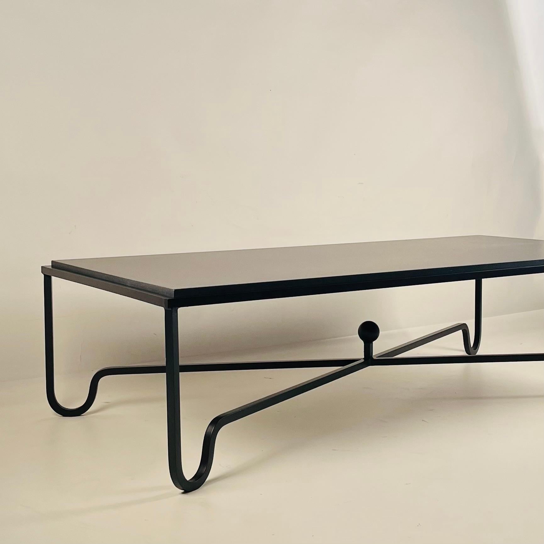 https://a.1stdibscdn.com/large-black-limestone-entretoise-coffee-table-by-design-freres-for-sale-picture-4/f_8184/f_451113821747764912813/Entretoise_Black_Limestone_Coffee_Table_3_master.jpg