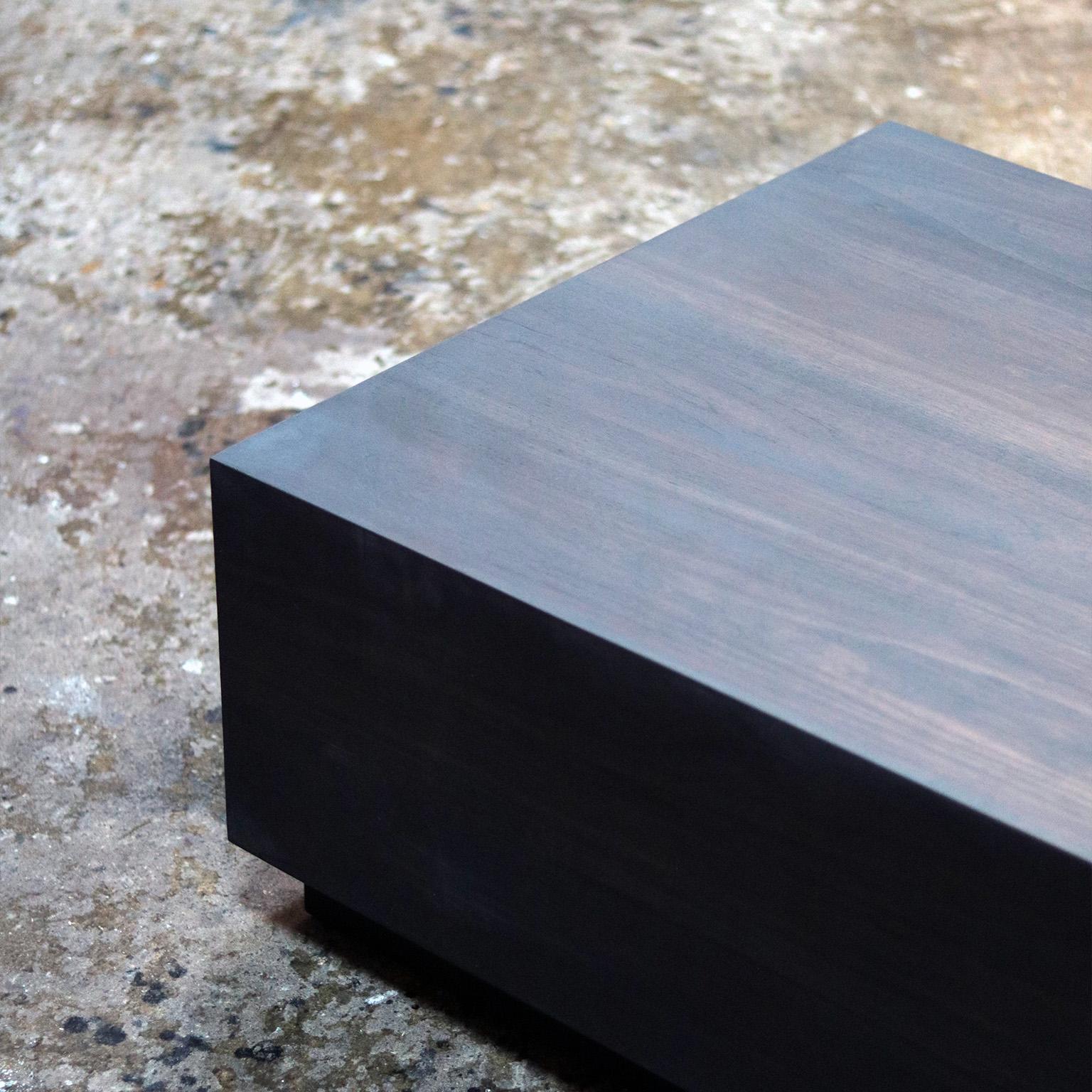 https://a.1stdibscdn.com/esau-solid-walnut-coffee-table-in-charcoal-finish-for-sale-picture-3/f_48391/f_460387721753669240773/Esau_detail_2_master.jpg