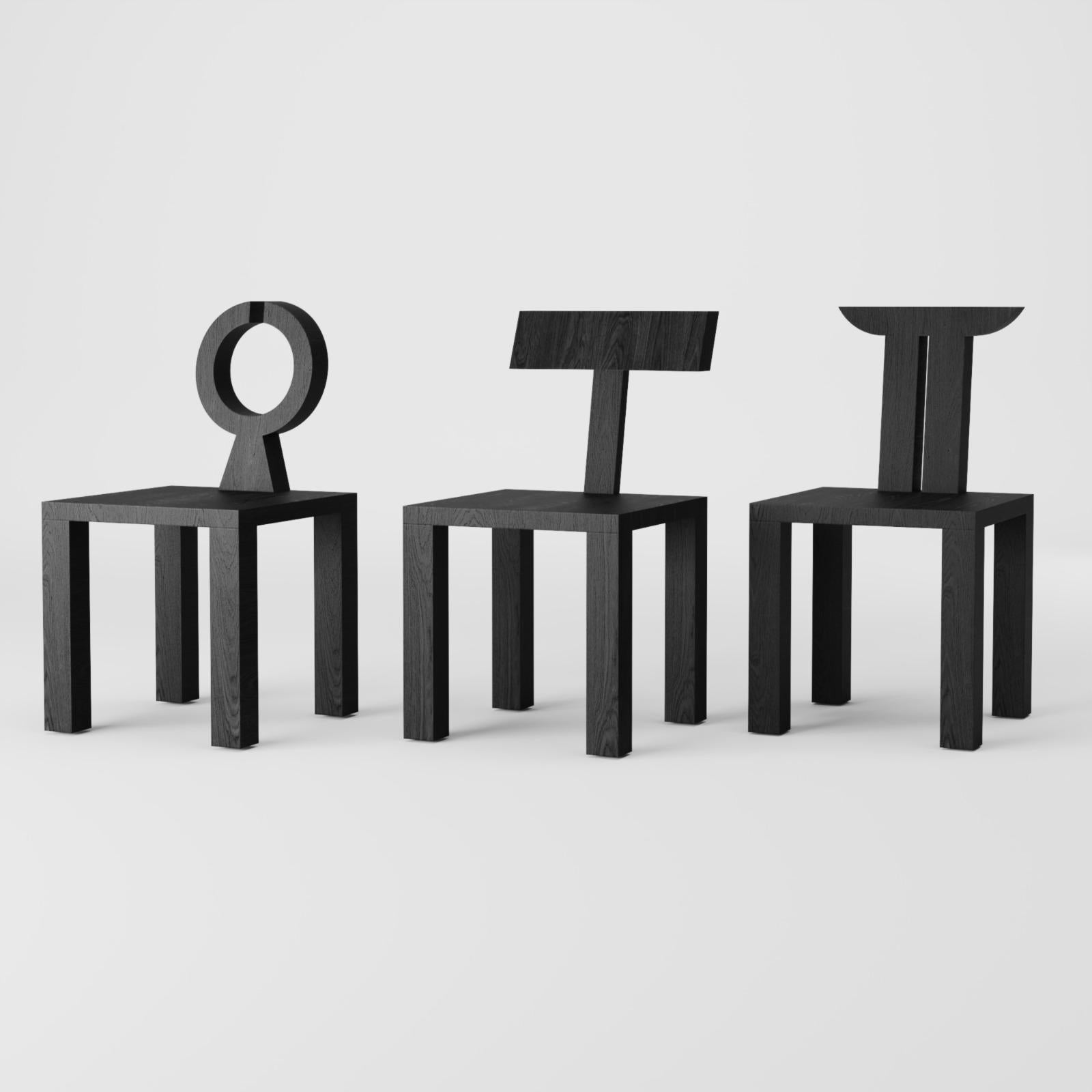 https://a.1stdibscdn.com/ebonized-wood-monograma-ii-chair-by-studio-orth-for-sale-picture-3/f_12192/f_480307021765980225827/Estu_dio_Orth_Colec_a_o_Monograma_master.jpeg