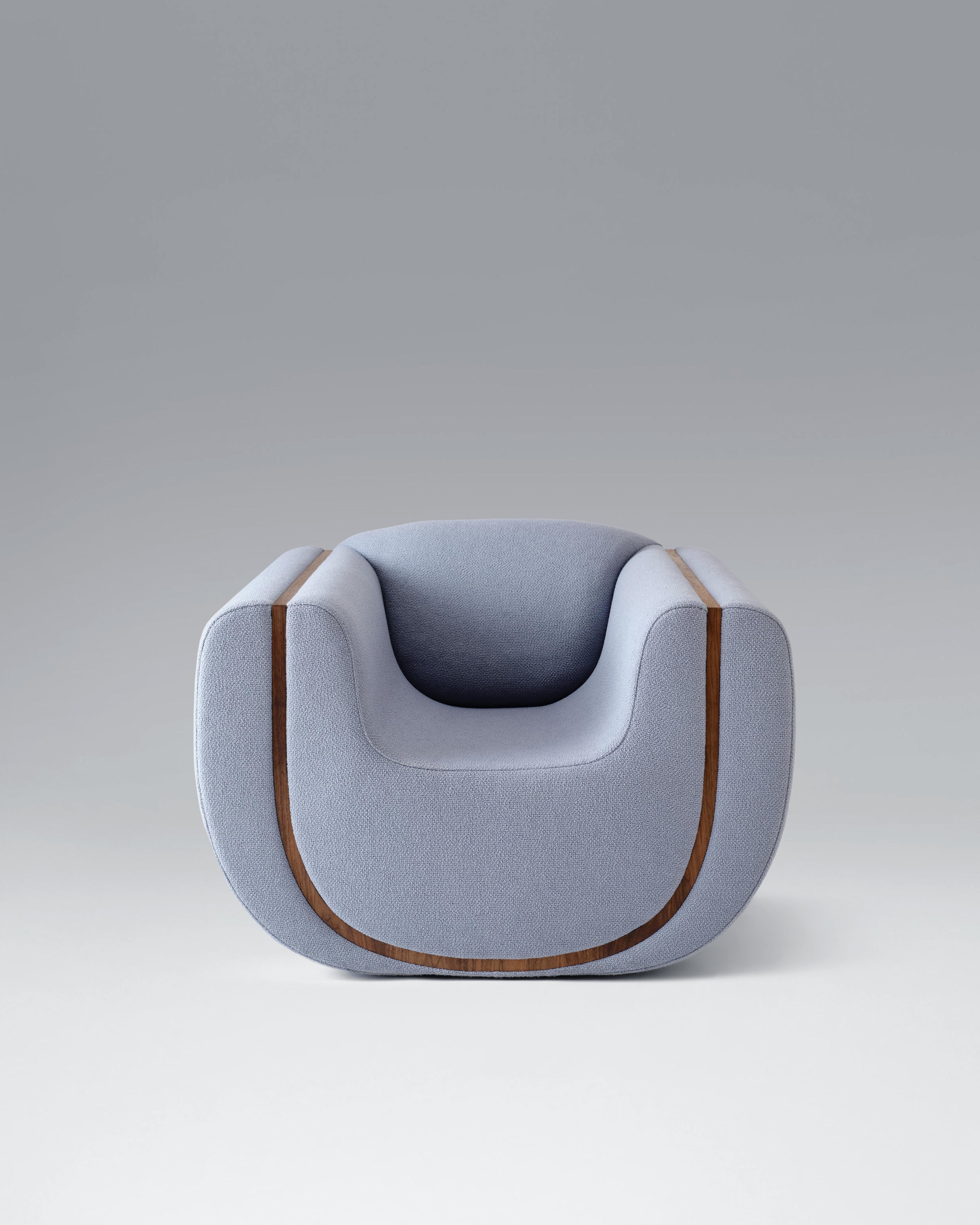 https://a.1stdibscdn.com/linea-armchair-upholstered-in-fabric-with-walnut-detail-by-estudio-persona-for-sale-picture-2/f_23783/f_315337821669847019339/EstudioPersona_Chair_1_master.jpg