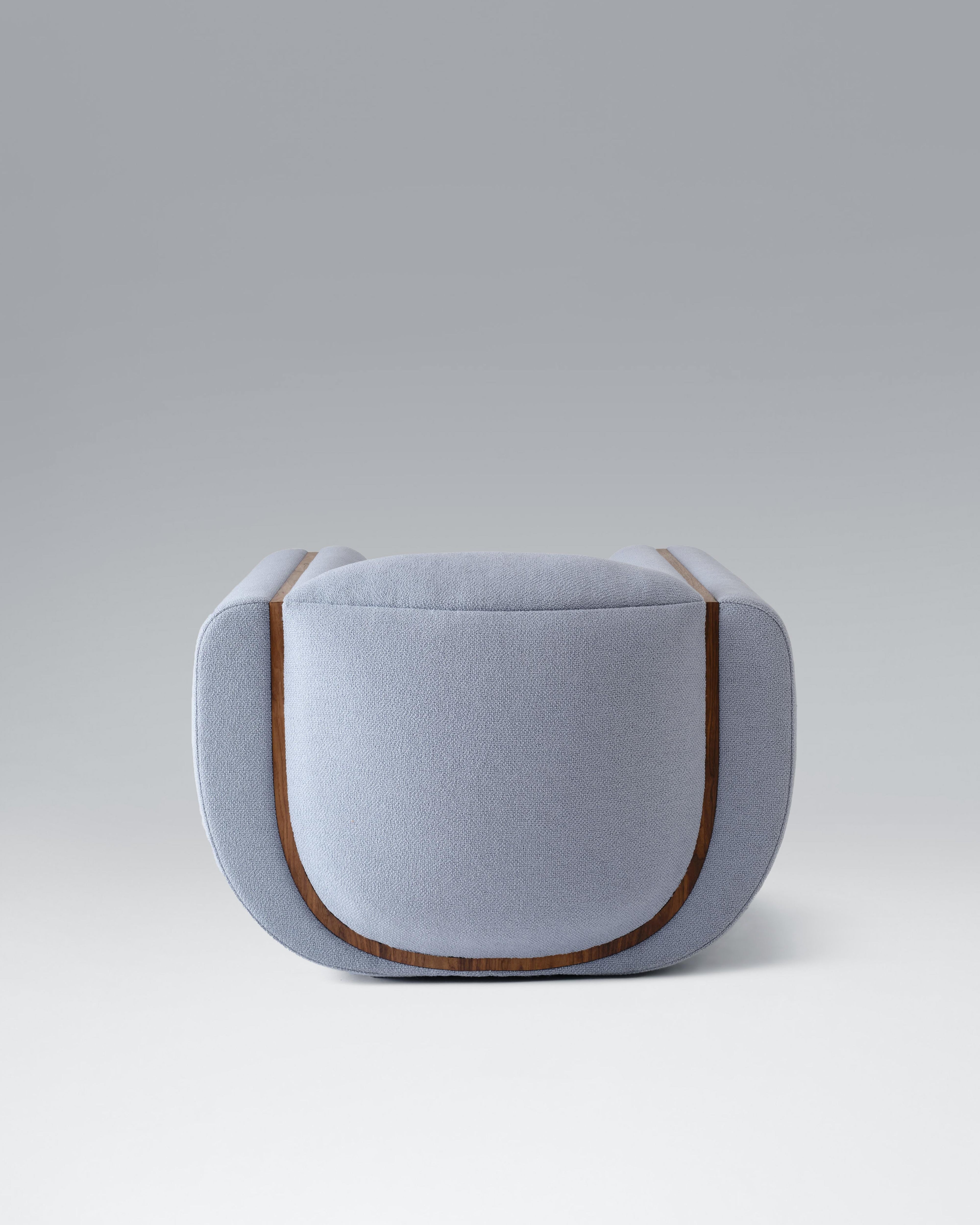 https://a.1stdibscdn.com/linea-armchair-upholstered-in-fabric-with-walnut-detail-by-estudio-persona-for-sale-picture-3/f_23783/f_315337821669847018628/EstudioPersona_Chair_3_master.jpg
